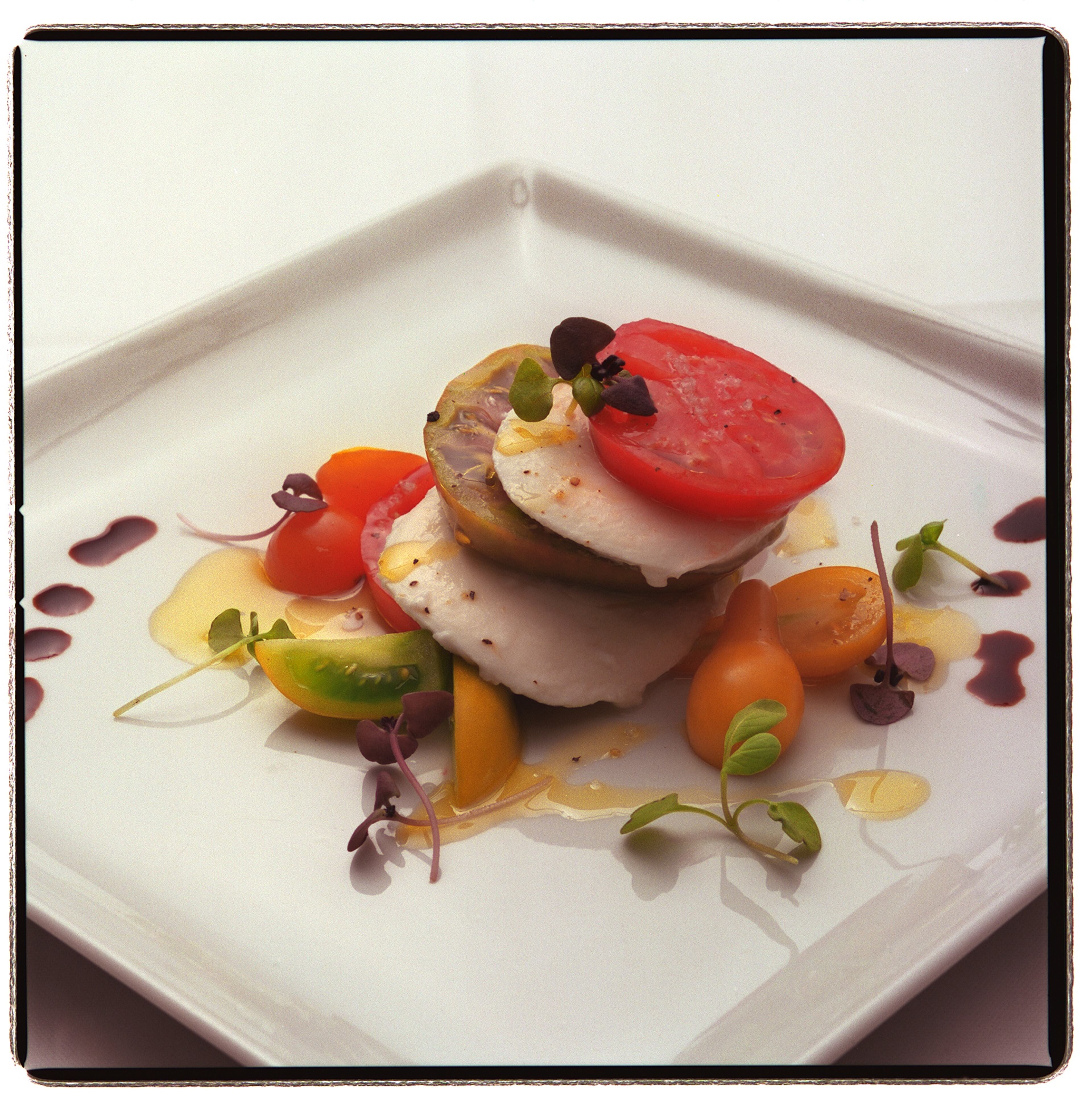 Georgia organic heirloom tomatoes with American buffalo mozzarella from Bacchanalia in 2000.