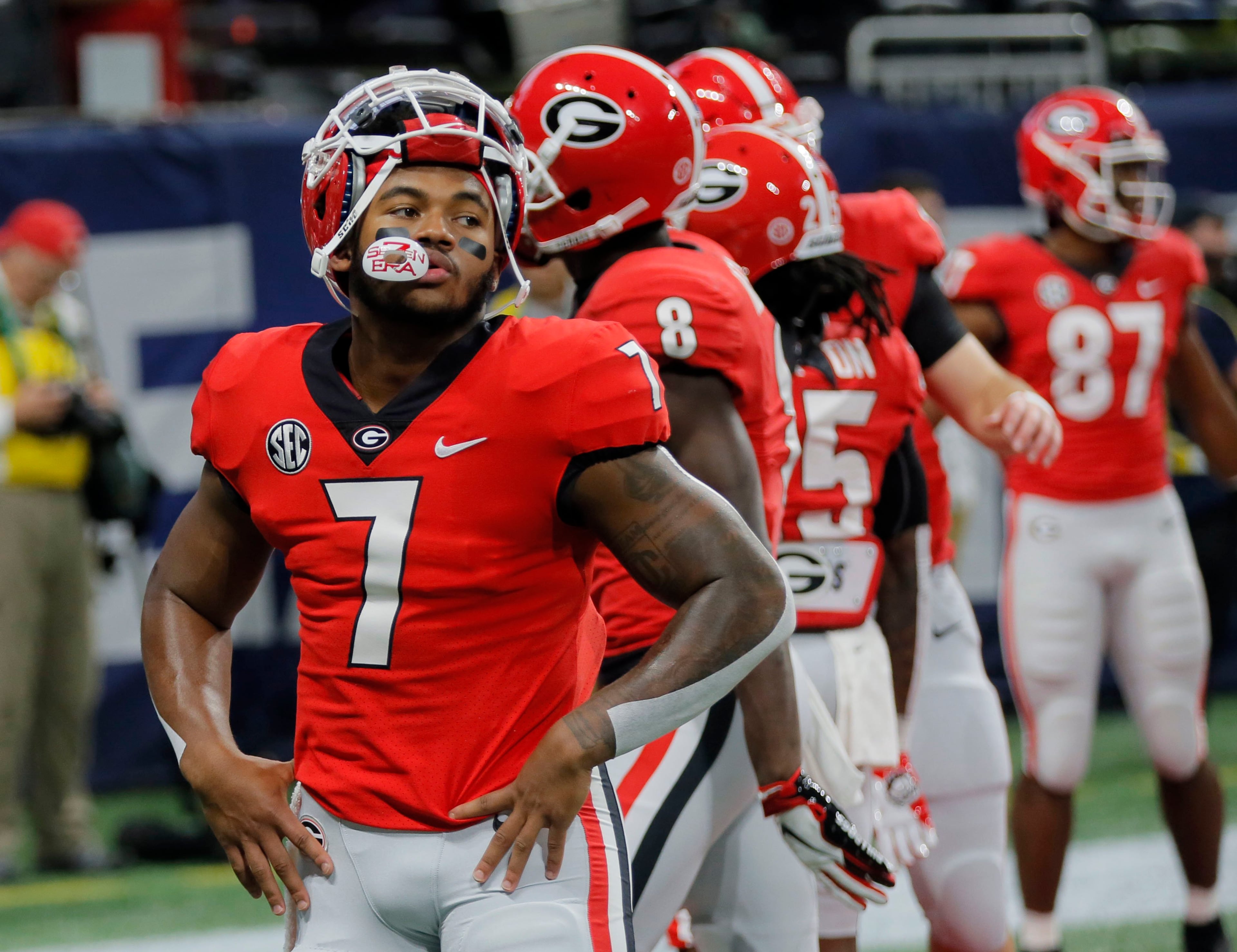 12/1/18 - Atlanta - Georgia Bulldogs running back D'Andre Swift (7) looks toward the Alabama side as the team was on the field for pregame warmups. The University of Georgia Bulldogs plays the Alabama Crimson Tide in a NCAA college football game for the Southeastern Conference Championship Saturday, Dec. 1, 2018, at Mercedes-Benz Stadium in Atlanta, GA. BOB ANDRES / BANDRES@AJC.COM