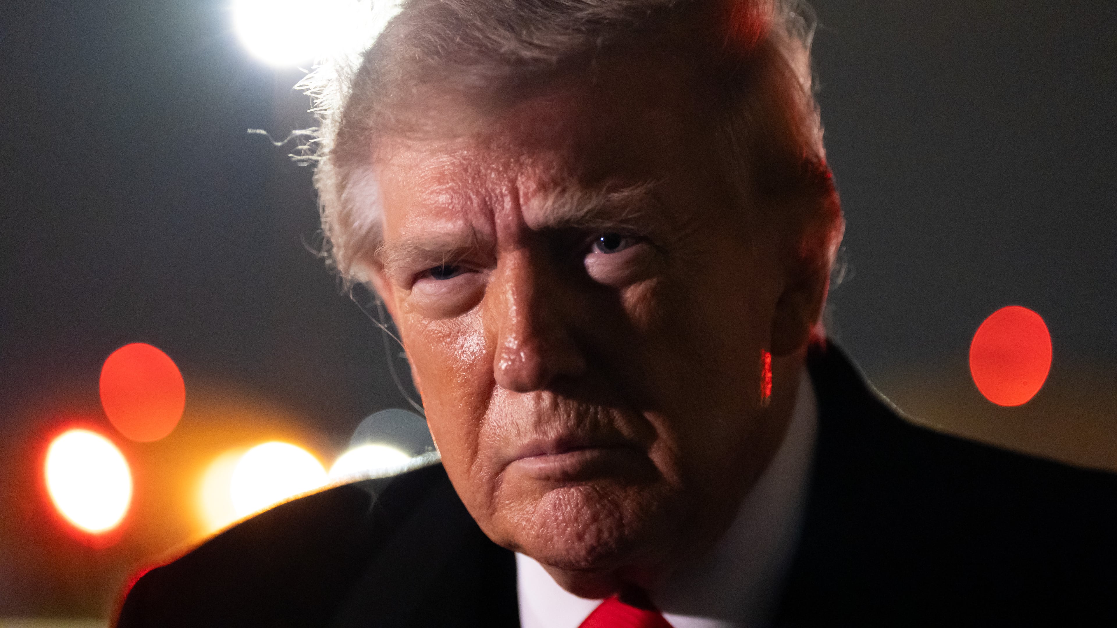 President Donald Trump speaks with reporters as he arrives on Air Force One, Saturday, Oct. 10, 2026, at Joint Base Andrews, Md. (AP Photo/Alex Brandon)