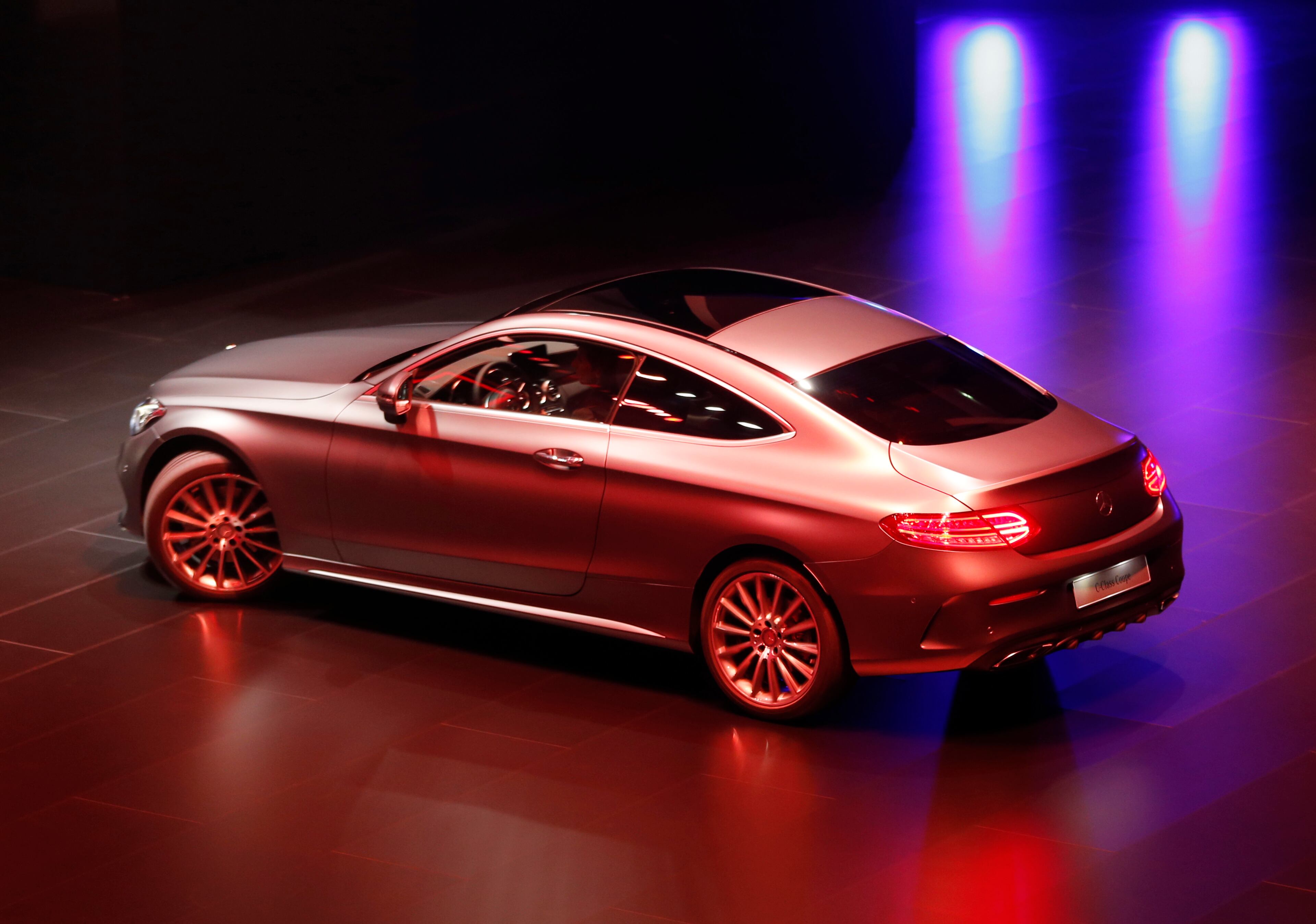 A Mercedes C-Class Coupe is presented on the first press day of the Frankfurt Auto Show IAA in Frankfurt, Germany, Tuesday, Sept. 15, 2015. The car show runs through Sept. 27. (AP Photo/Michael Probst)