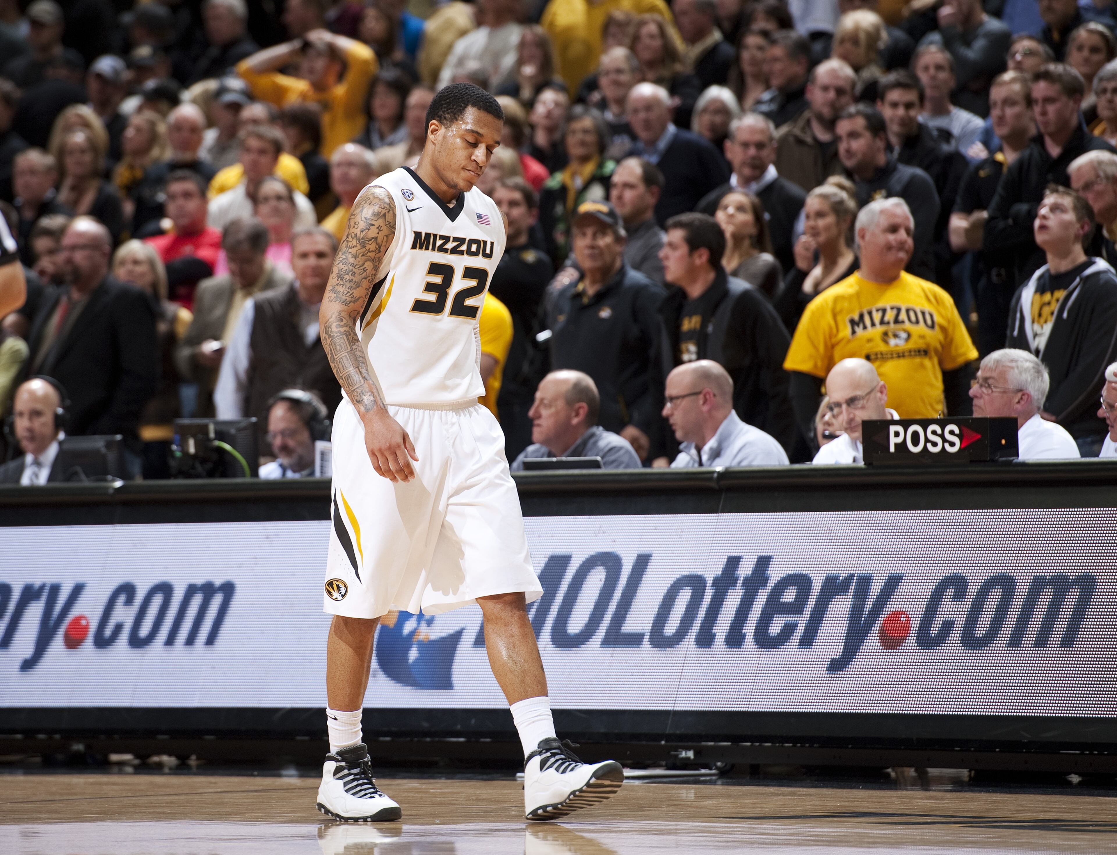 Missouri's Jabari Brown walks dejectedly down the court after missing a three-point shot during overtime of an NCAA college basketball game against Georgia Wednesday, Jan. 8, 2014, in Columbia, Mo. Georgia won the game 70-64 in overtime. (AP Photo/L.G. Patterson)