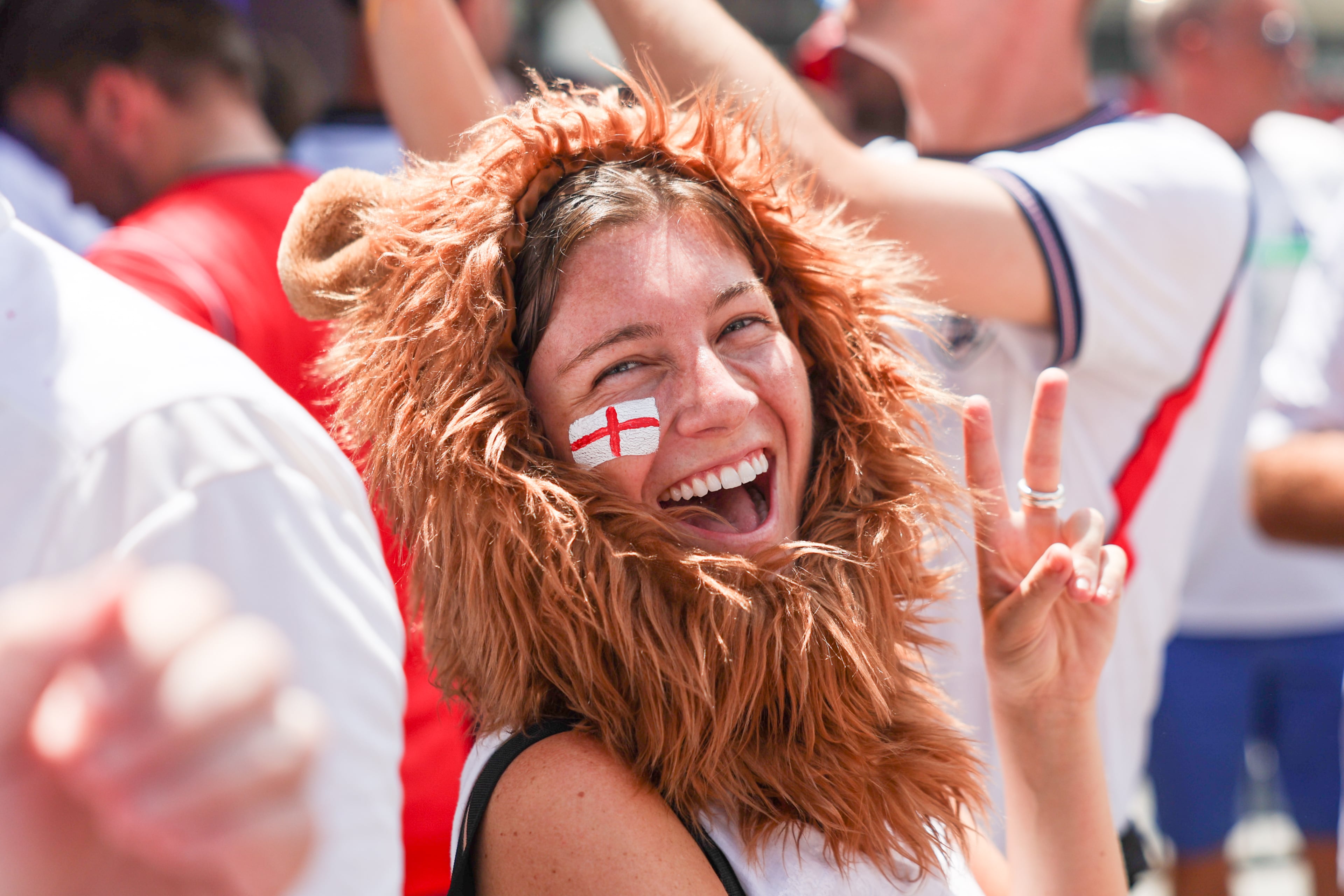 England fan Annie Zinrak celebrates at Irish Exit before the FIFA World Cup game against Argentina in Atlanta on July 15, 2026. It’s the final World Cup game Atlanta is hosting. (Arvin Temkar/AJC)