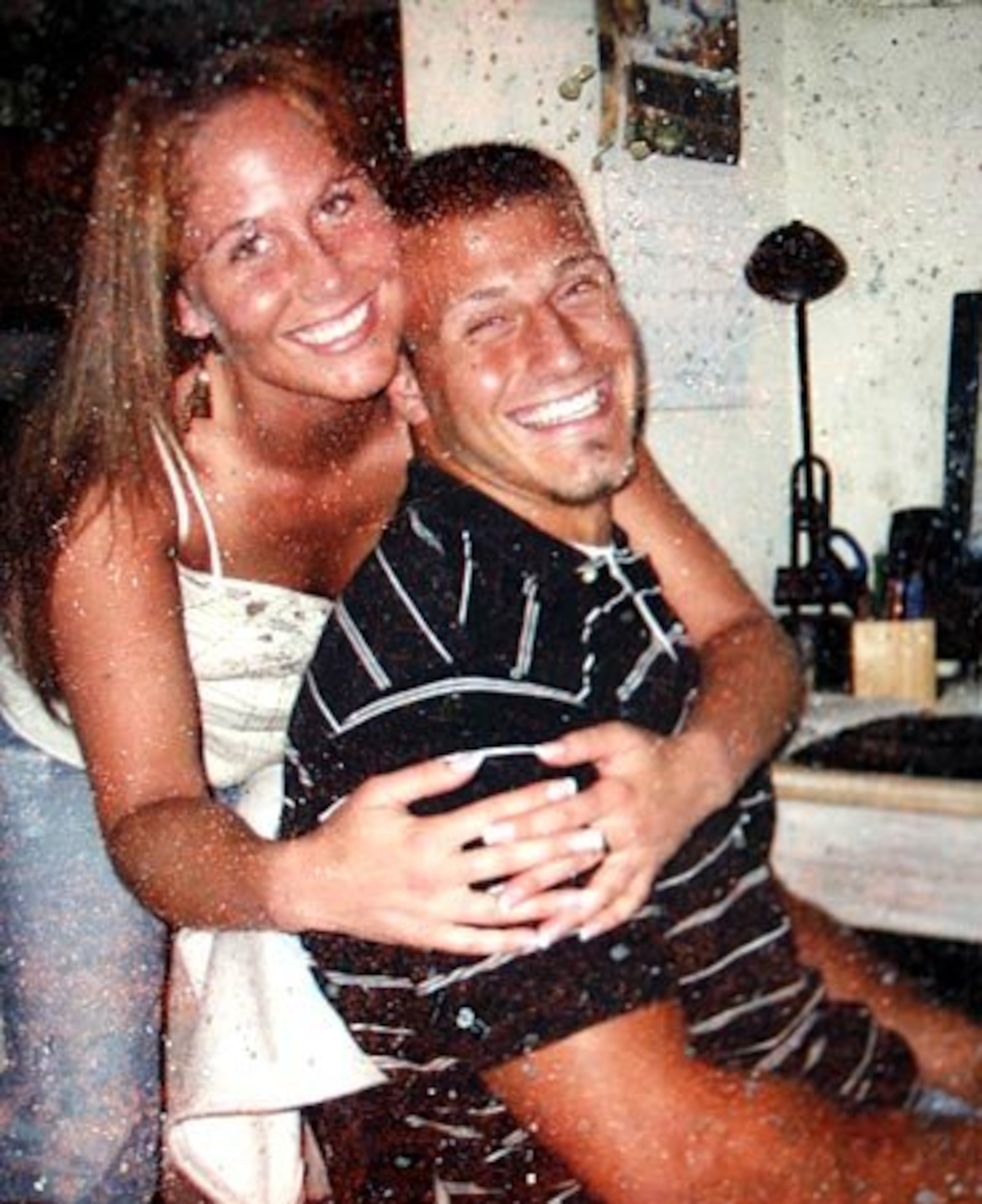 Schuyler (here, with girlfriend Paula Olivera in 2007) was one of four men reported missing March 1, 2009, after a fishing boat did not return as expected near Tampa.
