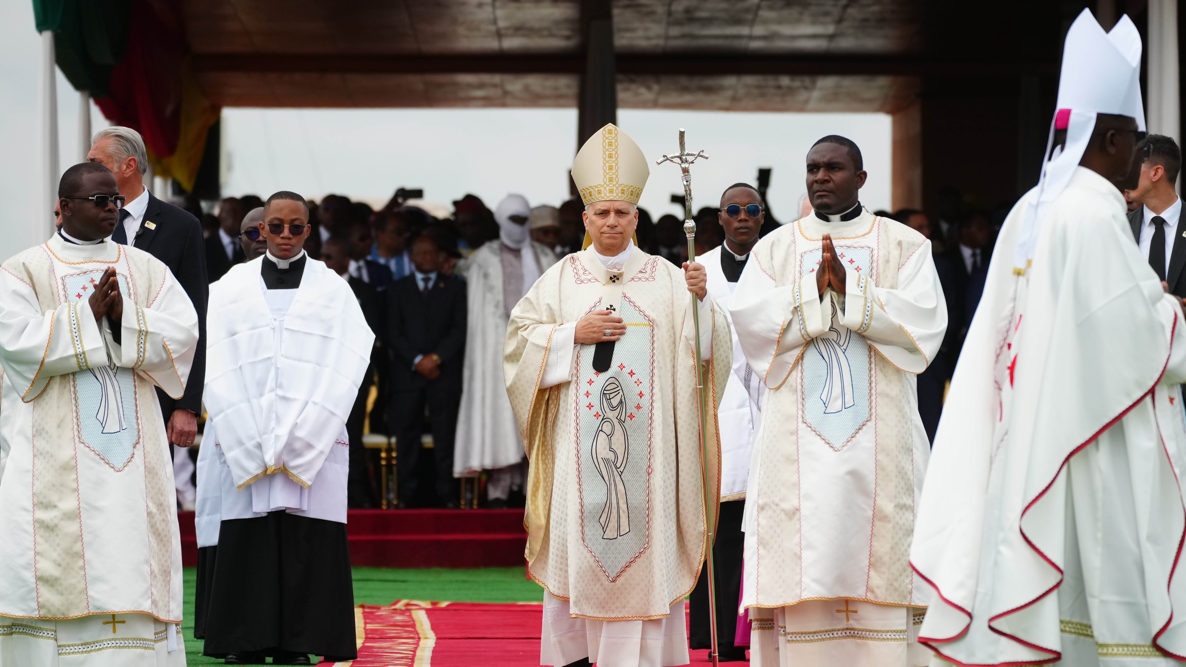Pope Leo XIV arrives in procession to celebrate Mass at Yaounde Ville Airport, Cameroon, Saturday, April 18, 2026 on the sixth day of his 11-day pastoral visit to Africa. (AP Photo/Andrew Medichini)