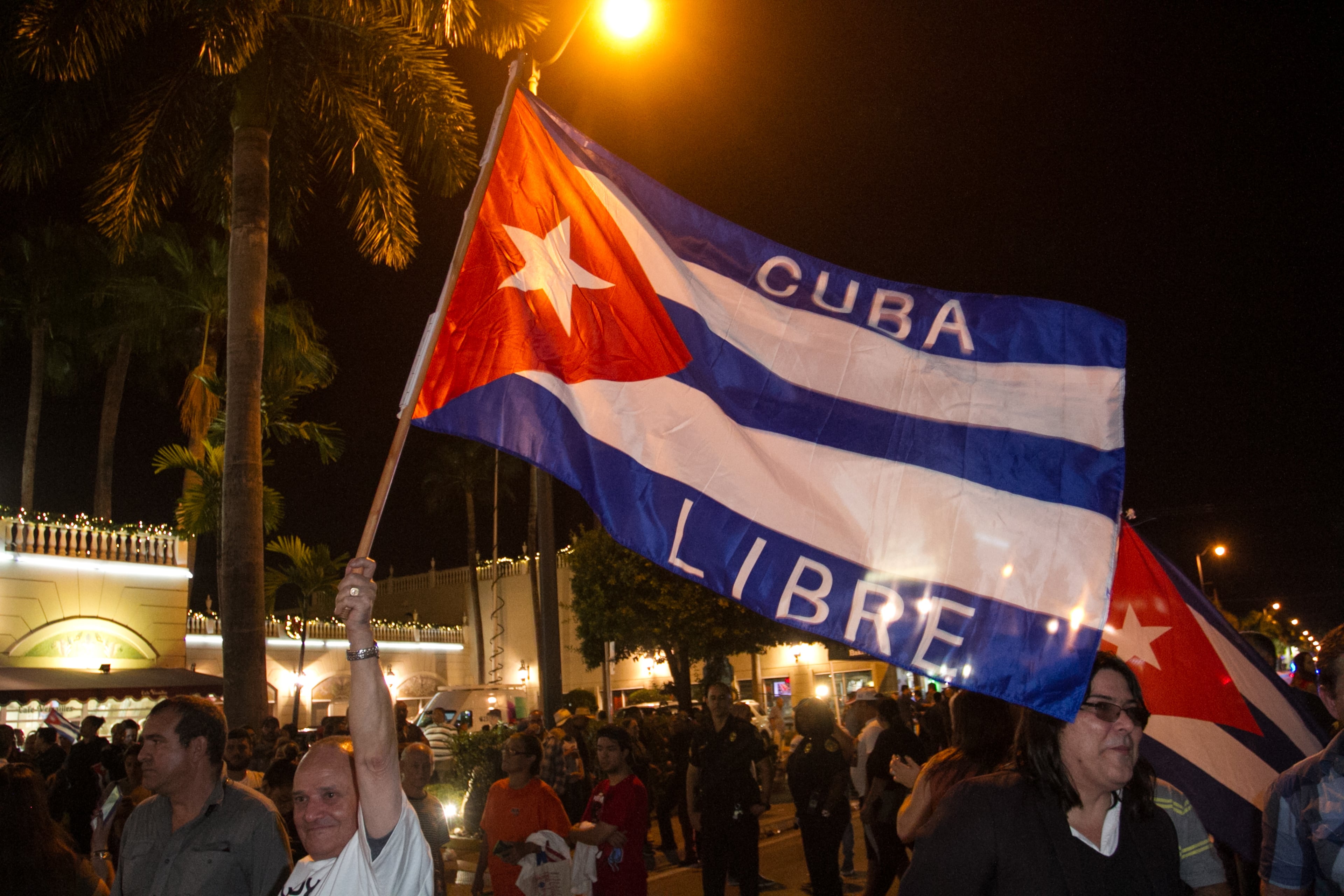 MIAMI, FL - NOVEMBER 26: Cuban Americans celebrate upon hearing about the death of longtime Cuban leader Fidel Castro in the Little Havana neighborhood of Miami, on November 26, 2016 in Miami, Florida.. Cuba's socialist icon and father of his country's revolution Fidel Castro died on November 25 aged 90, after defying the US during a half-century of ironclad rule and surviving the eclipse of global communism. (Photo by John Parra/Getty Images)