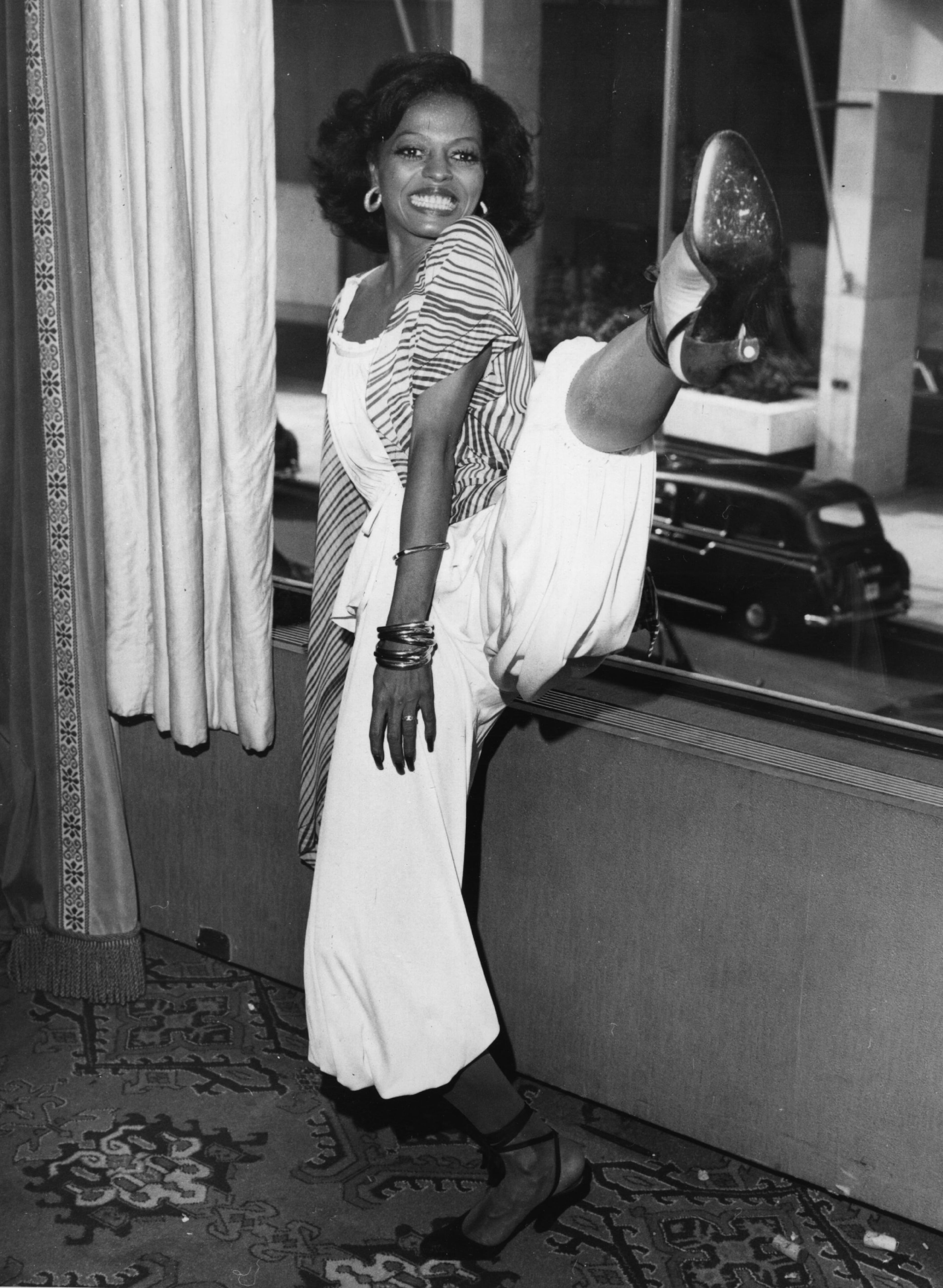 Actress and singer Diana Ross, high kicking during a press conference at London's Inn On The Park Hotel. (Photo by Mike Stephens/Central Press/Getty Images)