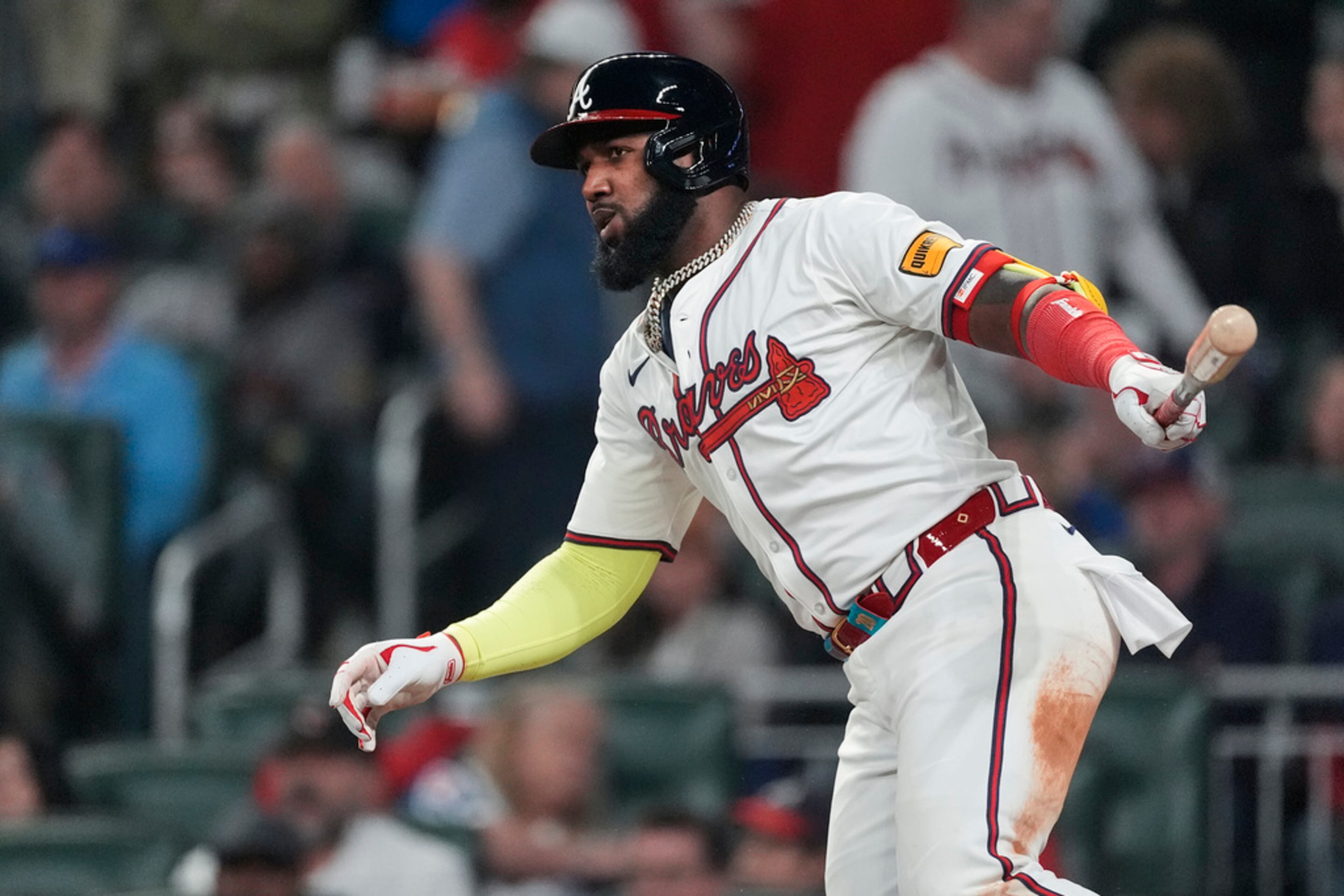 Atlanta Braves designated hitter Marcell Ozuna (20) follows through on a single in the seventh inning of a baseball game against the Arizona Diamondbacks Saturday, April 6, 2024, in Atlanta. (AP Photo/John Bazemore)