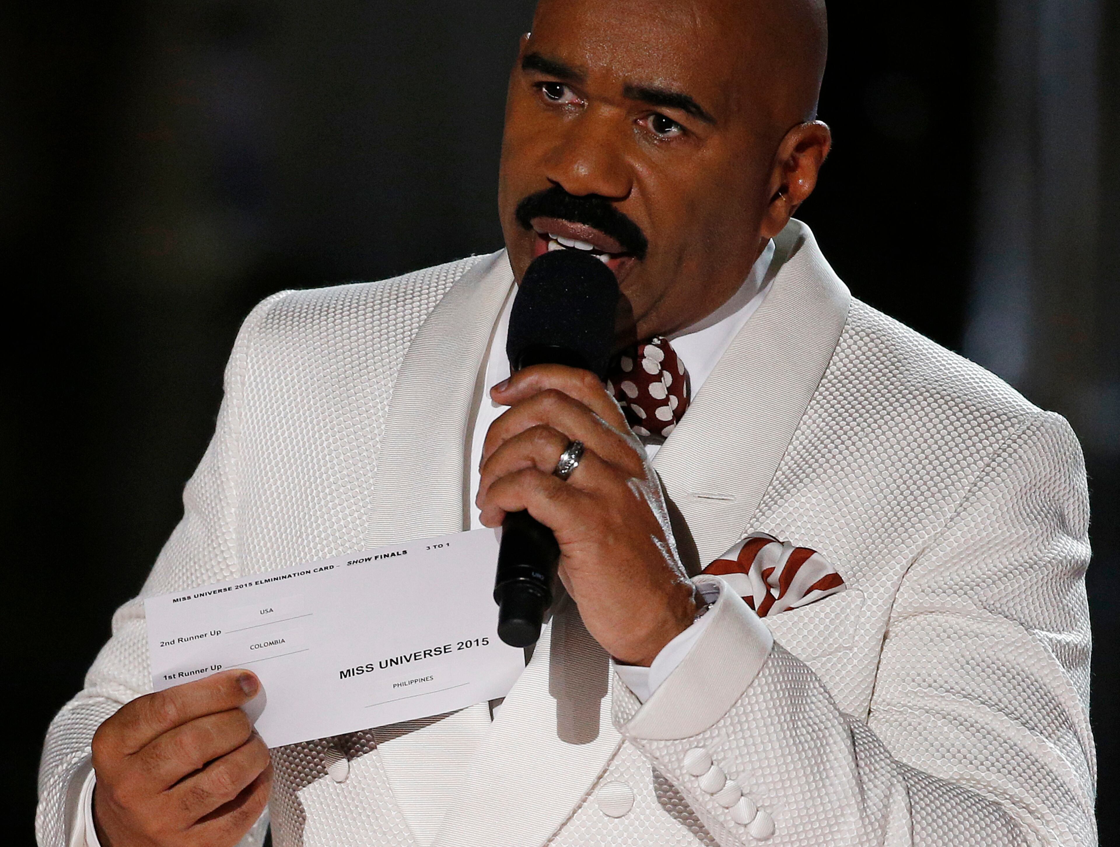Steve Harvey holds up the card showing the winners after he incorrectly announced Miss Colombia Ariadna Gutierrez at the winner at the Miss Universe pageant Sunday, Dec. 20, 2015, in Las Vegas. According to the pageant, a misreading led the announcer to read Miss Colombia as the winner before they took it away and gave it to Miss Philippines Pia Alonzo Wurtzbach.(AP Photo/John Locher)