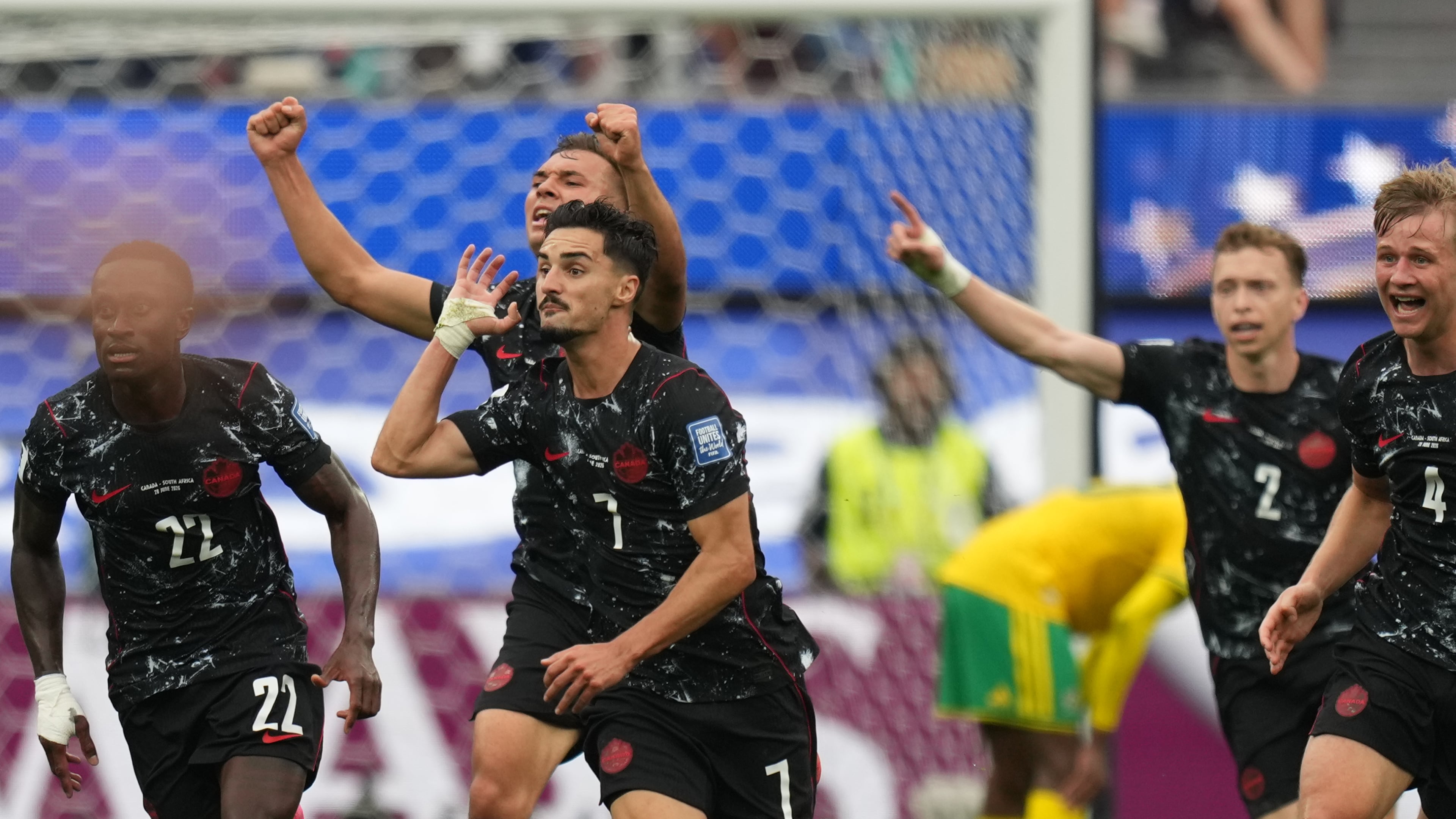 Canada's Stephen Eustaquio (7) celebrates scoring their opening goal against South Africa during the World Cup round of 32 soccer match in Inglewood, Calif., near Los Angeles, Sunday, June 28, 2026. (AP Photo/Andre Penner)