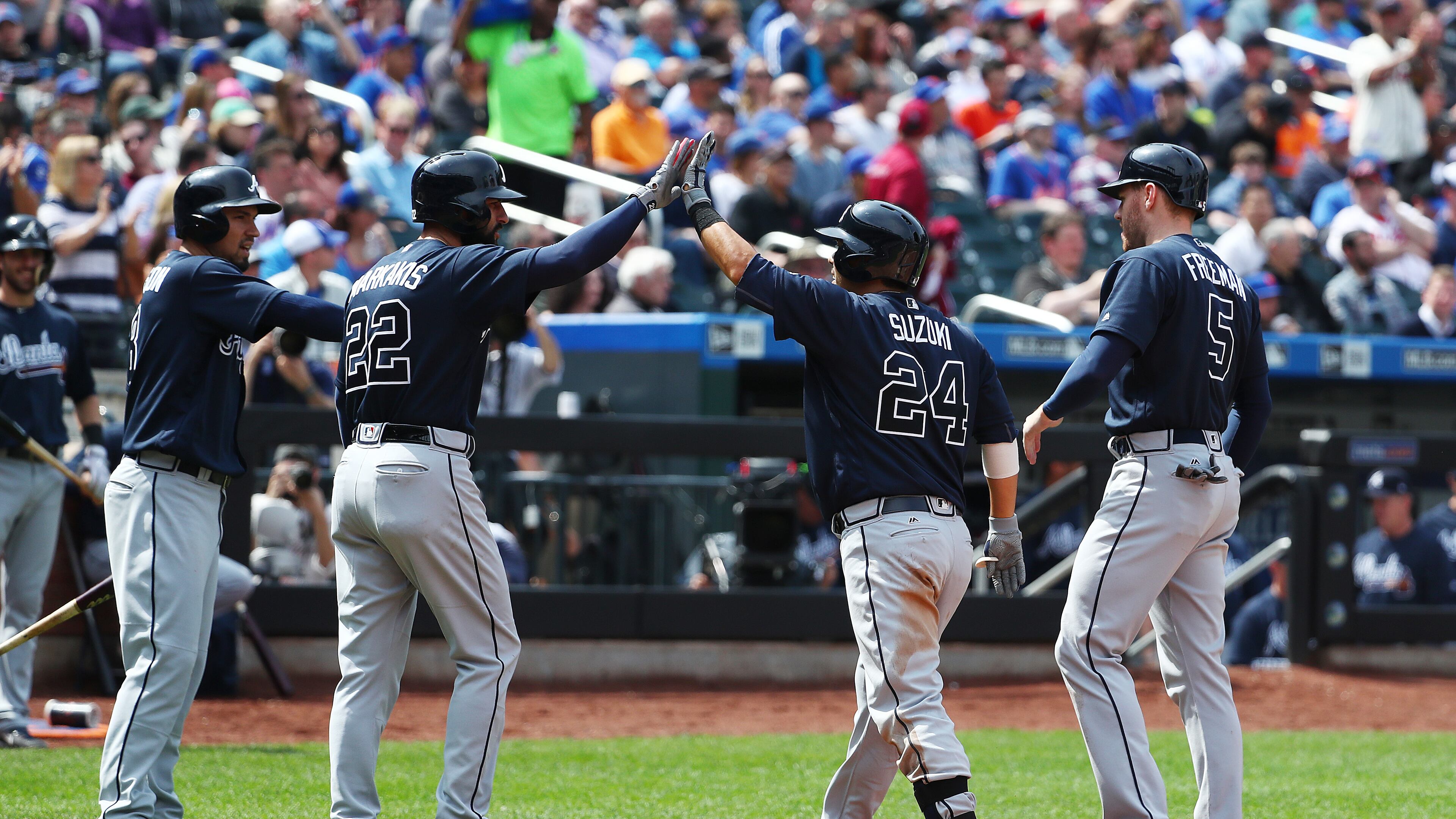 Kurt Suzuki of the Braves celebrates after hitting a three run home run against Matt Harvey of the New York Mets in the fourth inning. (Photo by Al Bello/Getty Images)