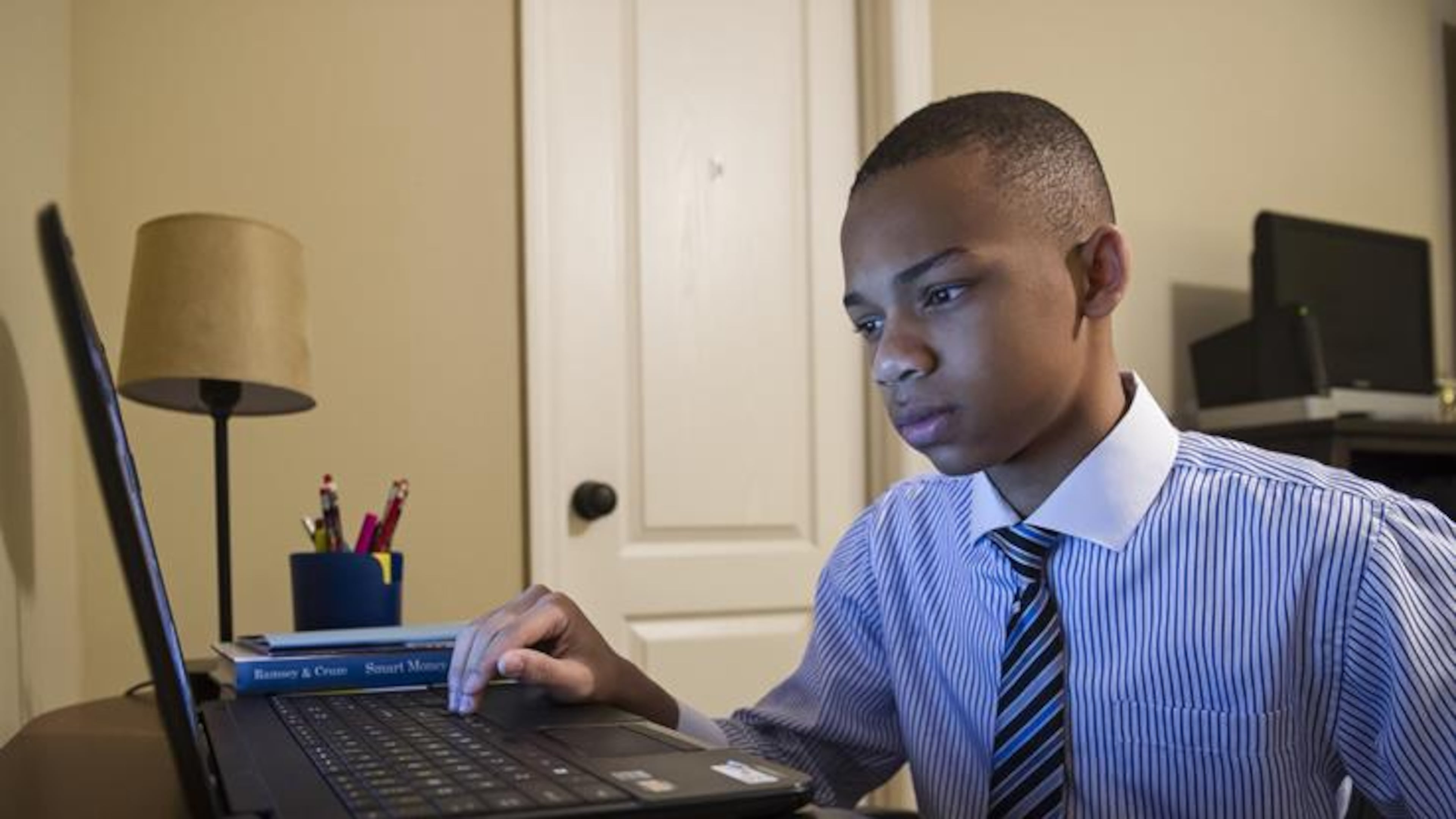 C.J. Pearson, 13, has become a conservative sensation for his biting attacks on Democratic policies. (AJC file)