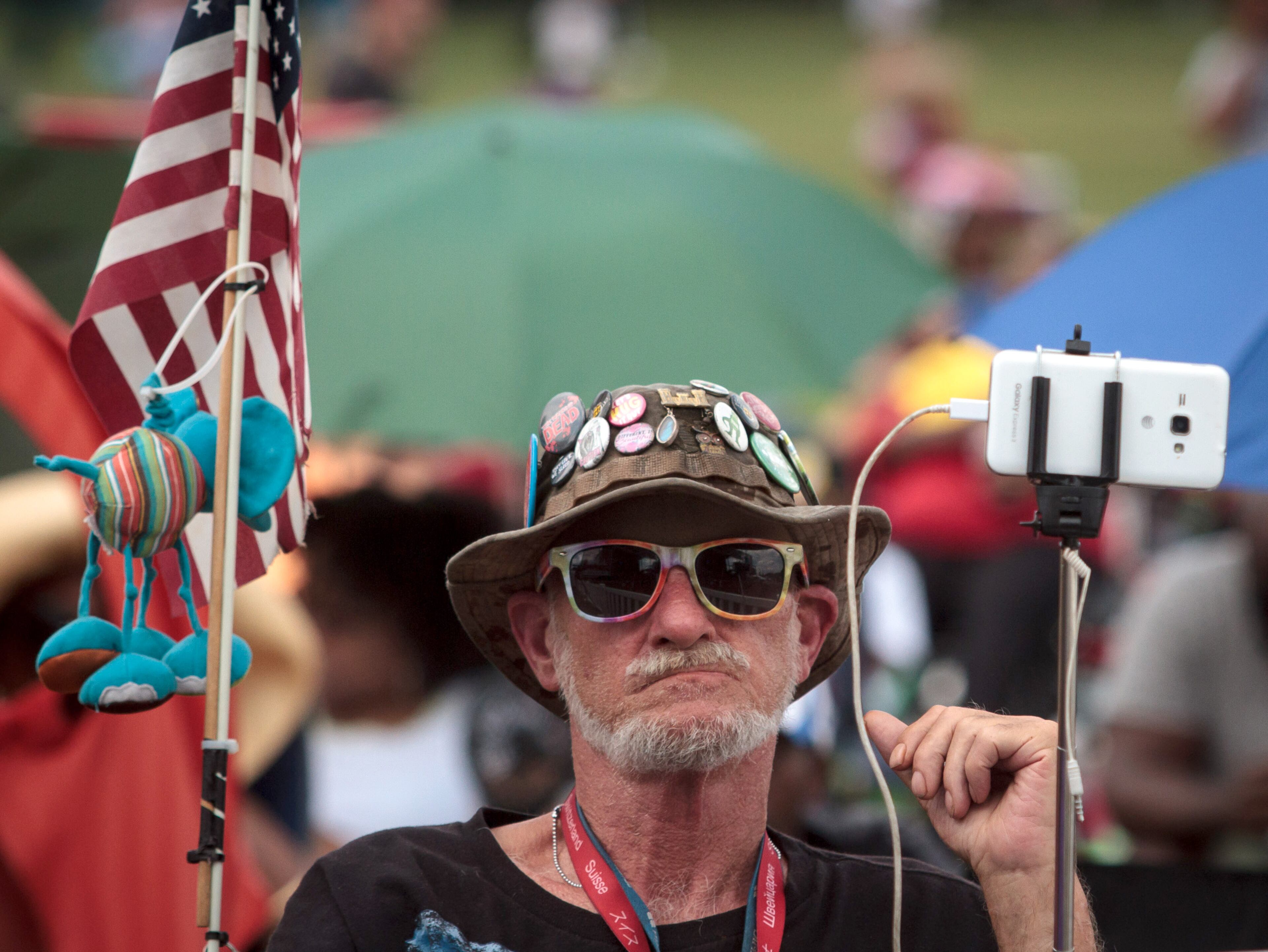John Plantaseed enjoys the music of Allan Harris on the Legend Stage during the Atlanta Jazz Festival in Piedmont Park Saturday, May 27, 2017. This year marks the 40th anniversary of the Atlanta Jazz Festival, one of the largest free jazz festivals in the country. STEVE SCHAEFER / SPECIAL TO THE AJC