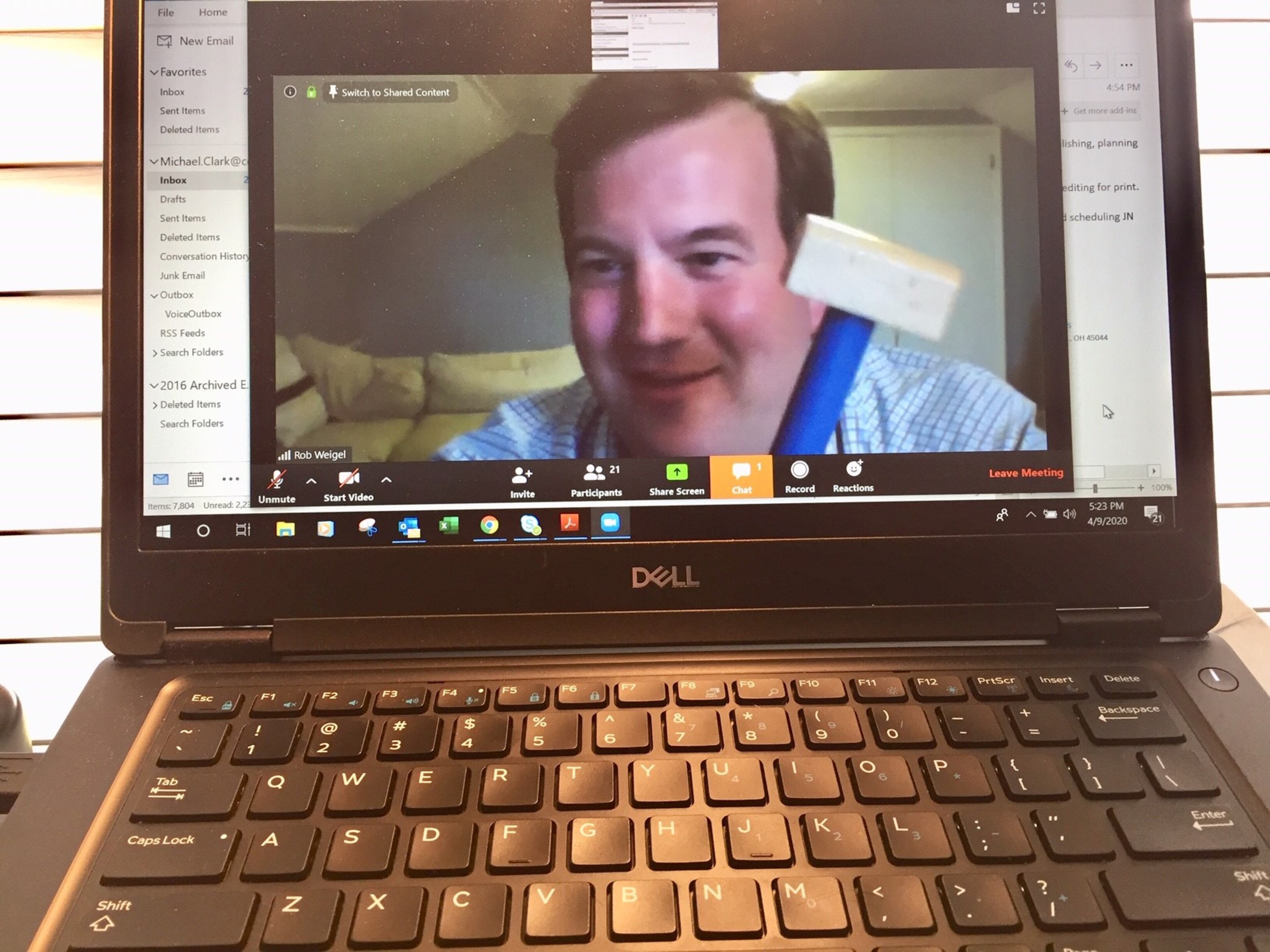 Hamilton Board of Education President Rob Weigel jokingly starts the district's first tele-conferencing board meeting by using his child's toy hammer in place of his regular president's gavel. The governing boards of area school systems are forced to hold their meetings remotely via online conferencing platforms as they wait out the end of the state-ordered coronavirus shut down of all schools and school events.
(Photo By Michael D. Clark/Journal-News)