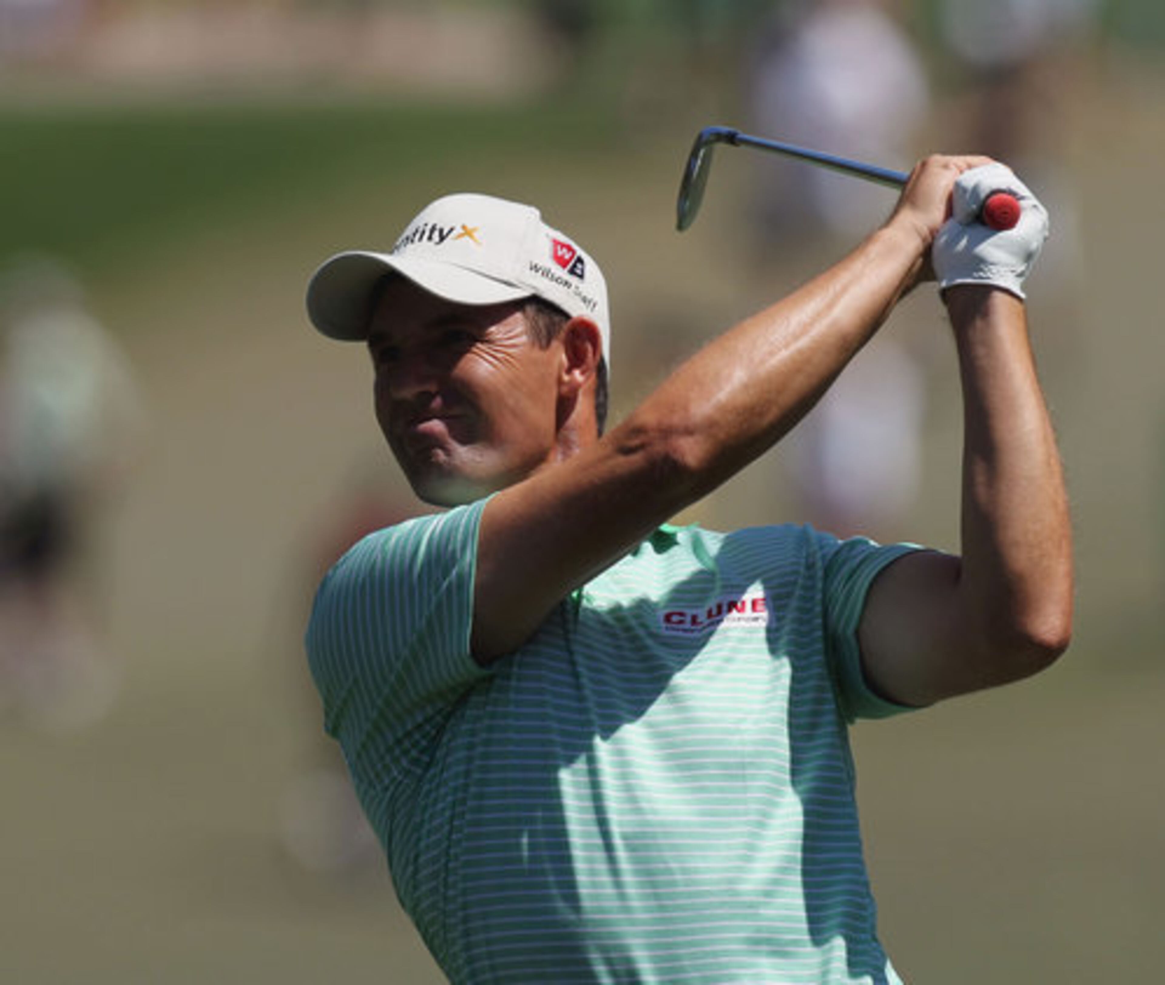 Paidraig Harrington hits from the No. 1 fairway to the green Sunday afternoon.
