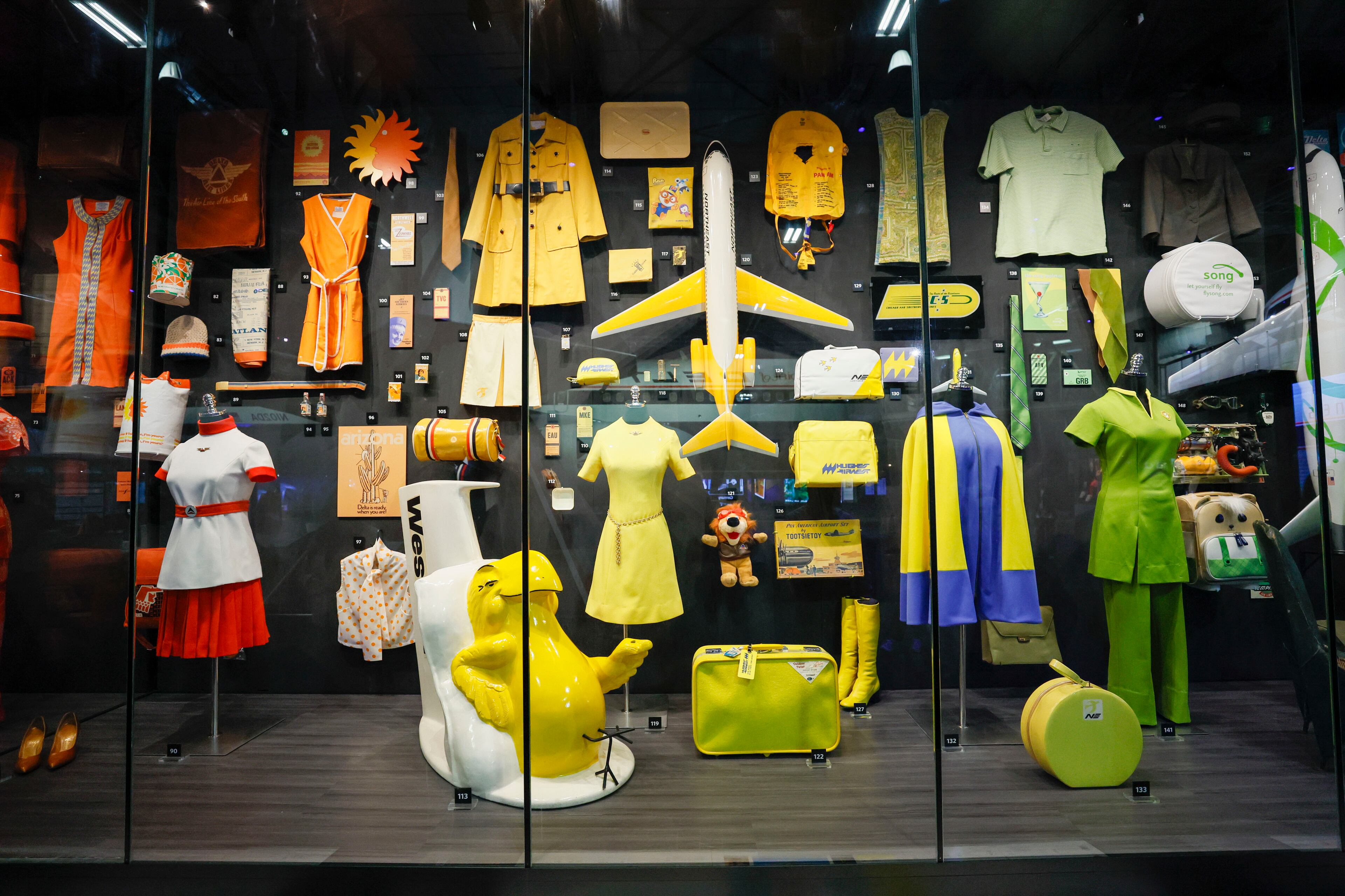 Artifacts from Delta mergers, including Western Airlines and Pan Am, are displayed inside the Spirit Hangar during a media tour of the Delta Flight Museum on Tuesday, March 25, 2025. (Miguel Martinez/AJC)