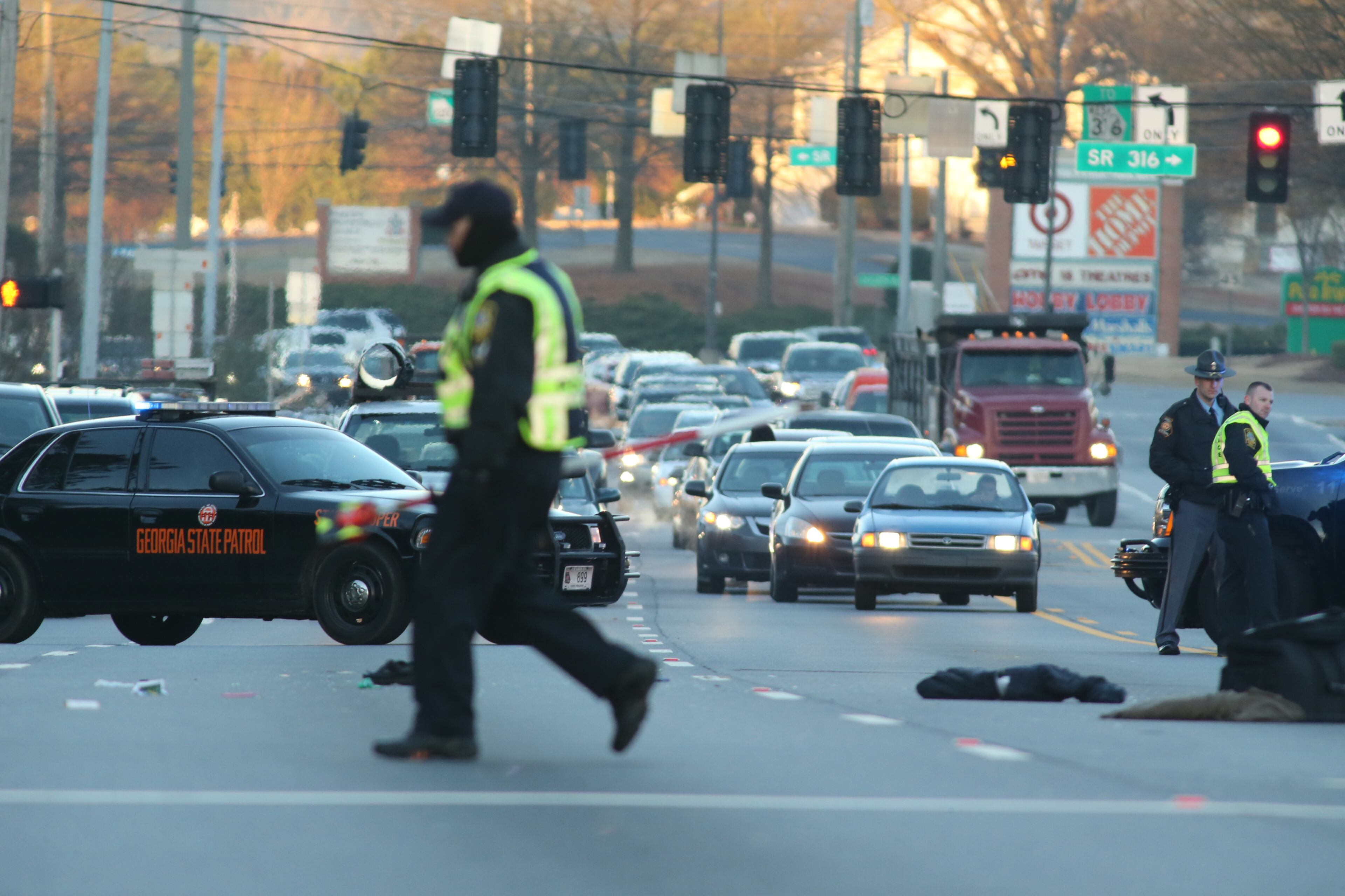 Lawrenceville police were investigating a pedestrian fatality early Thursday in front of Gwinnett Medical Center. The person was struck by a car and killed before 6 a.m. at the intersection of Duluth Highway and Medical Center Boulevard. On the ground is investigators' equipment.
