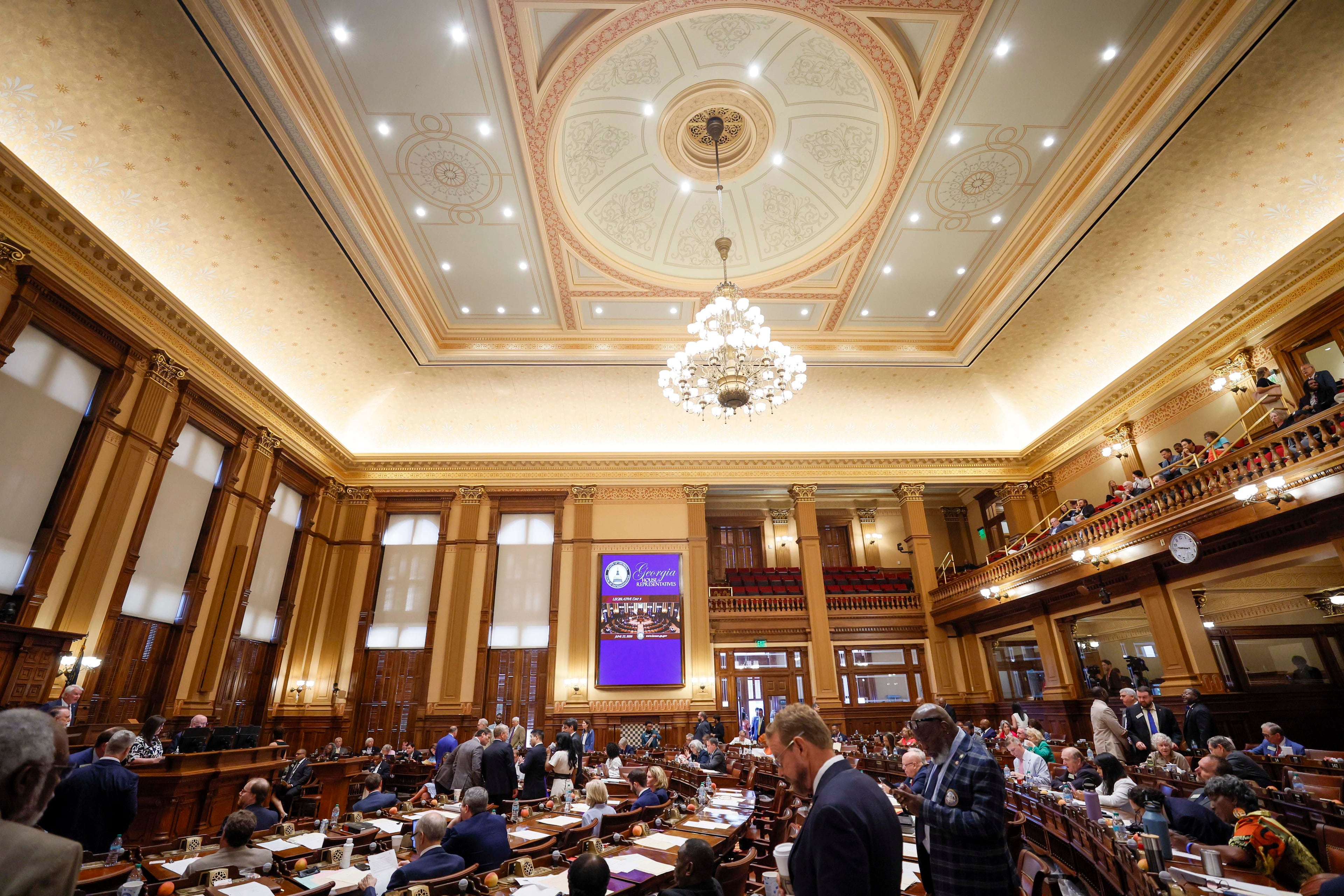 Members of the state House of Representatives at the start of the final day of a special legislative session at the Georgia Capitol in Atlanta on Tuesday. (Miguel Martinez/AJC)