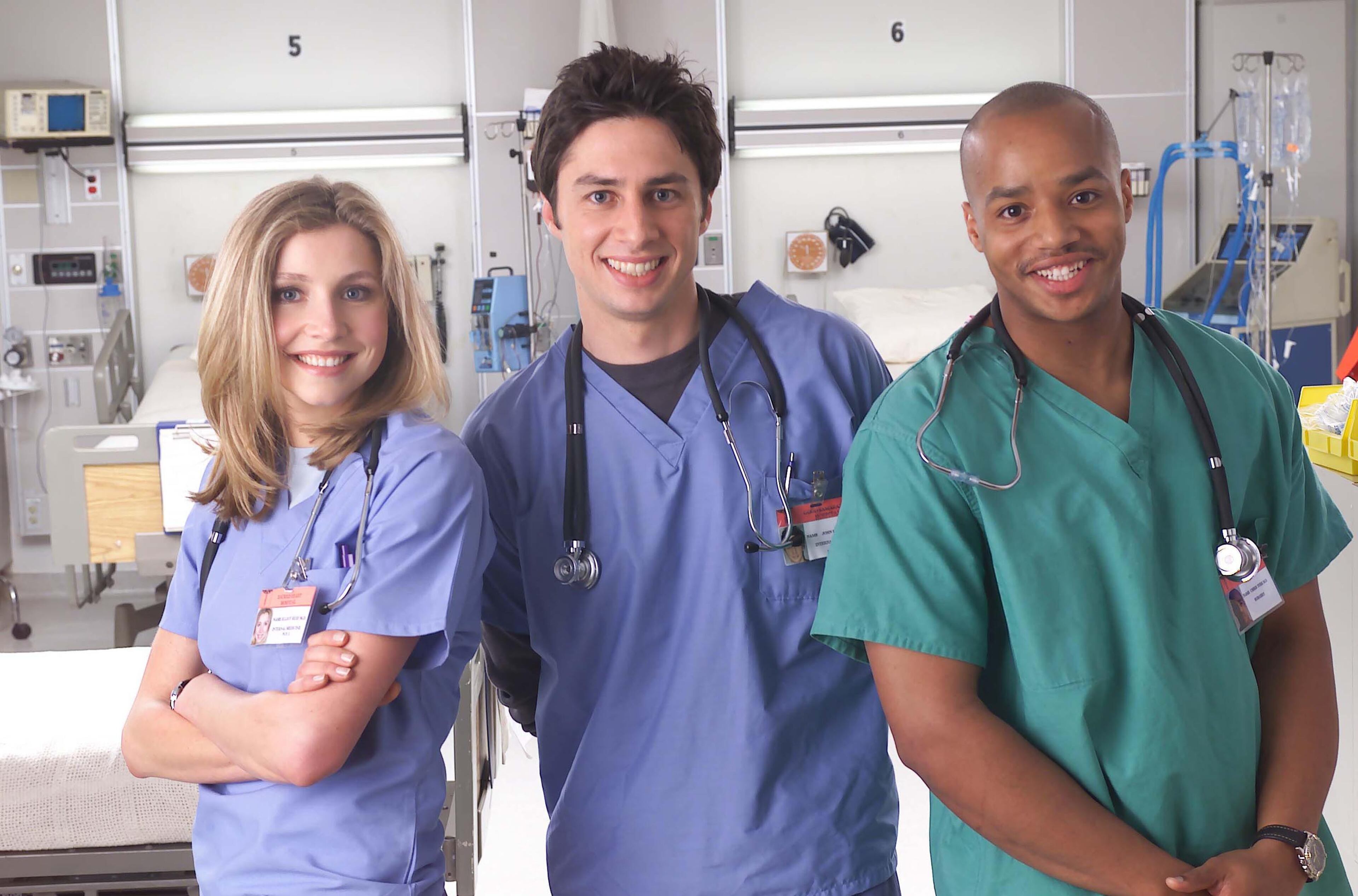 Actors Sarah Chalke (left) as Elliot, Zach Braff as J.D. and Donald Faison as Turk in "Scrubs."