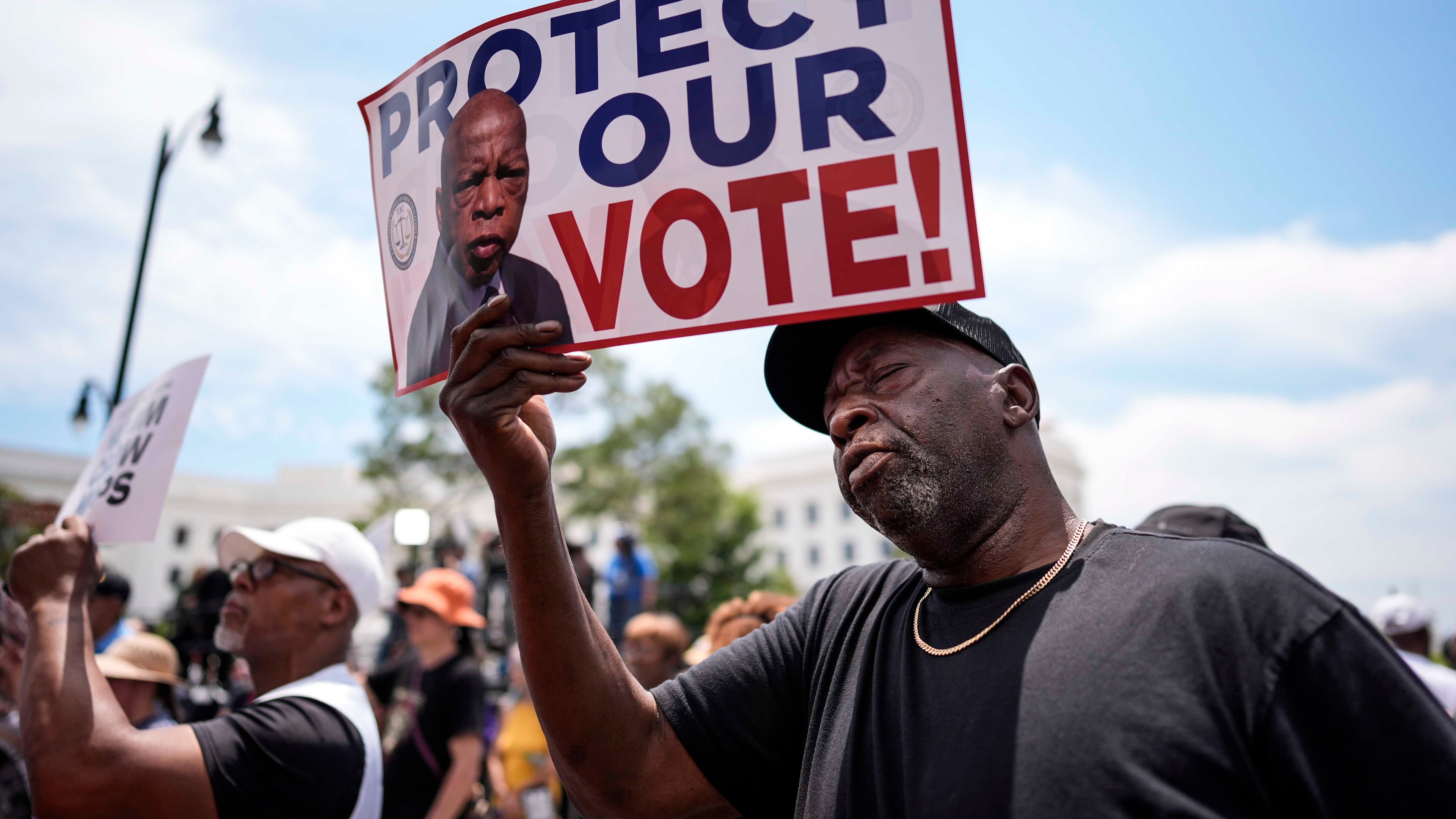 Aaron McGuire sings a spirtual song during a voting rally, Saturday, May 16, 2026, in Montgomery, Ala. (AP Photo/Mike Stewart)
