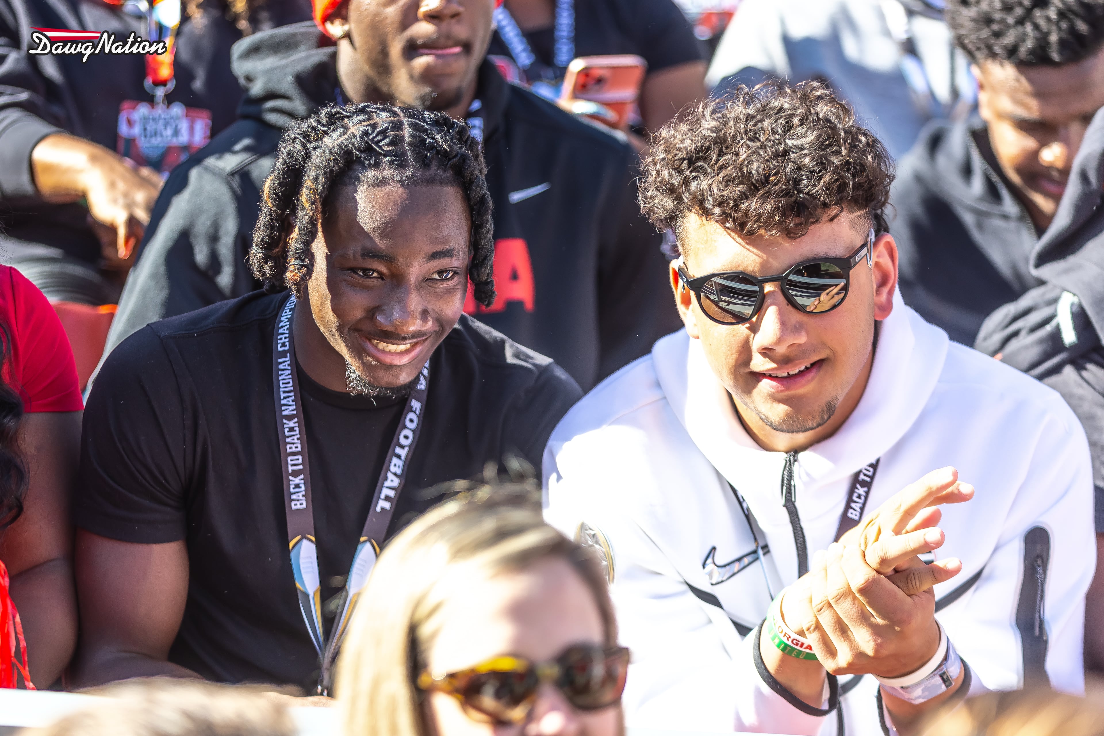 Five-stars Ellis Robinson IV (left) and Dylan Raiola (right) take in the Georgia-Missouri game inside Sanford Stadium on Saturday, Nov. 4, 2023. (Jeff Sentell/DawgNation)