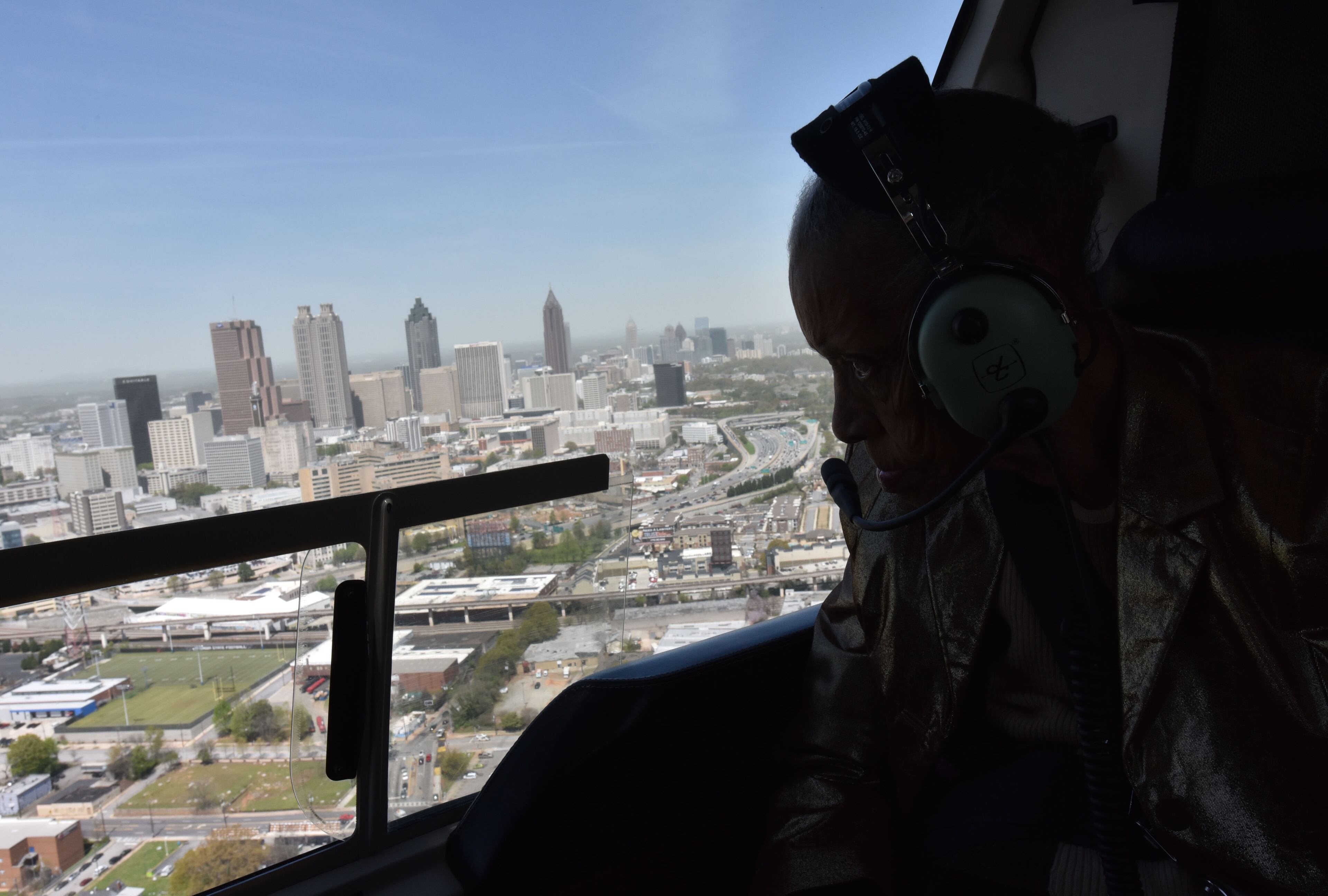 Thelma Knox, a resident of Pruitt Health Decatur, and her son Lee Knox boarded the helicopter and enjoyed a 30-minute tour above Stone Mountain, downtown Atlanta and Buckhead. HYOSUB SHIN / HSHIN@AJC.COM