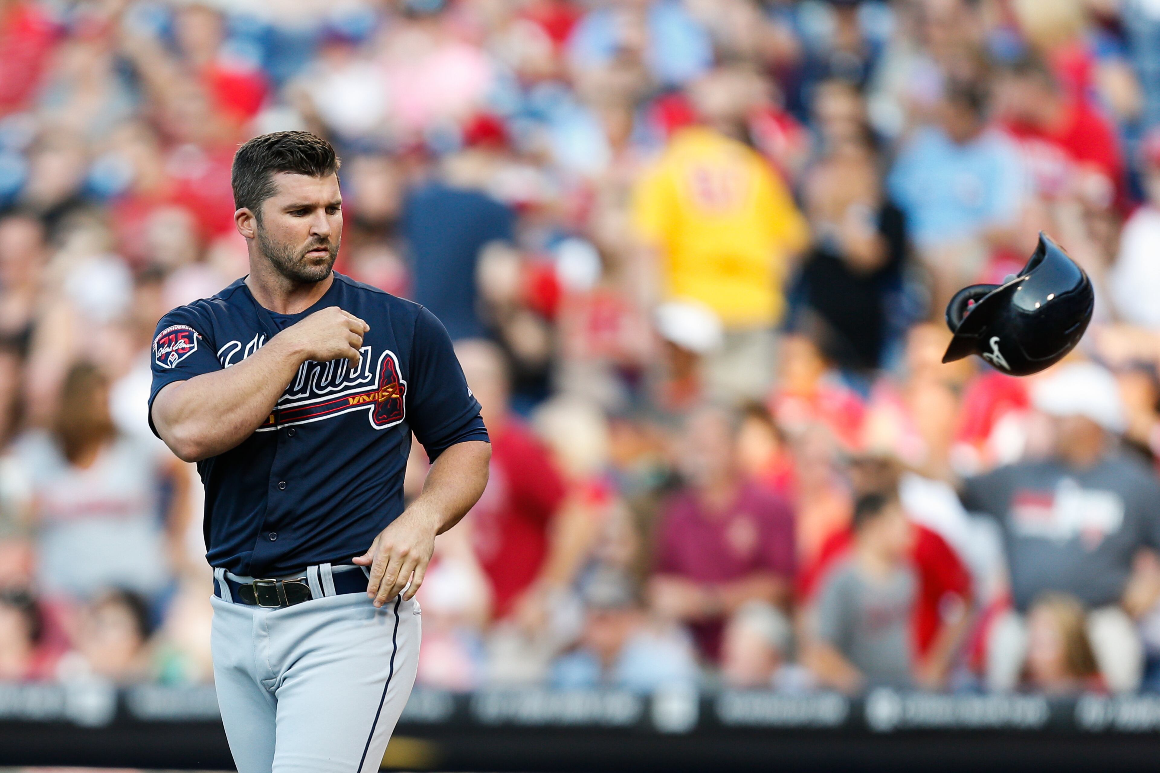 PHILADELPHIA, PA - JUNE 27: Dan Uggla #26 of the Atlanta Braves tosses his helmet after striking out in the first inning of the game against the Philadelphia Phillies at Citizens Bank Park on June 27, 2014 in Philadelphia, Pennsylvania. (Photo by Brian Garfinkel/Getty Images)