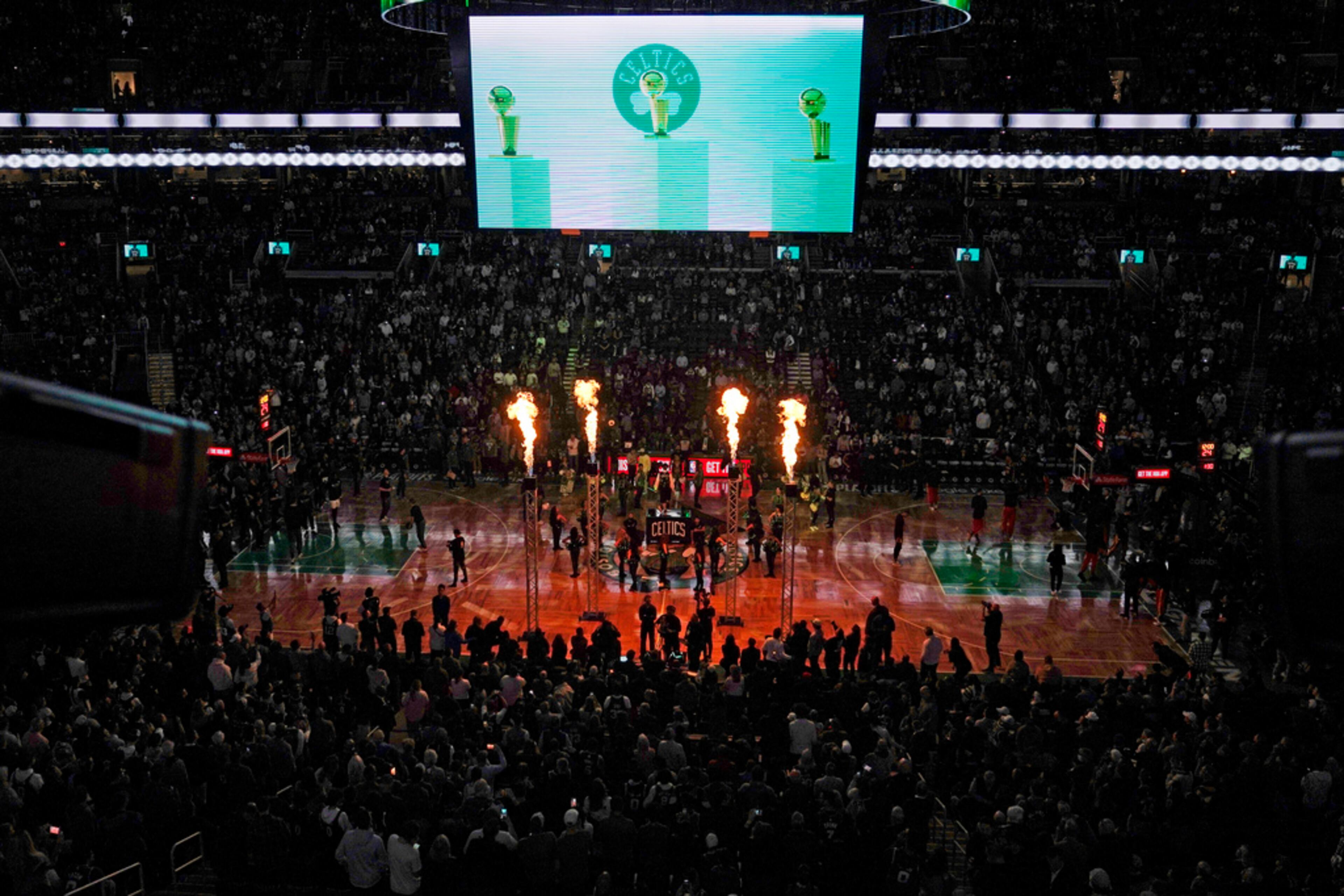 Pyro flames shoot upwards during a pregame ceremony prior to Game 2 in the first round of the NBA basketball playoffs, Tuesday, April 18, 2023, in Boston. (AP Photo/Charles Krupa)