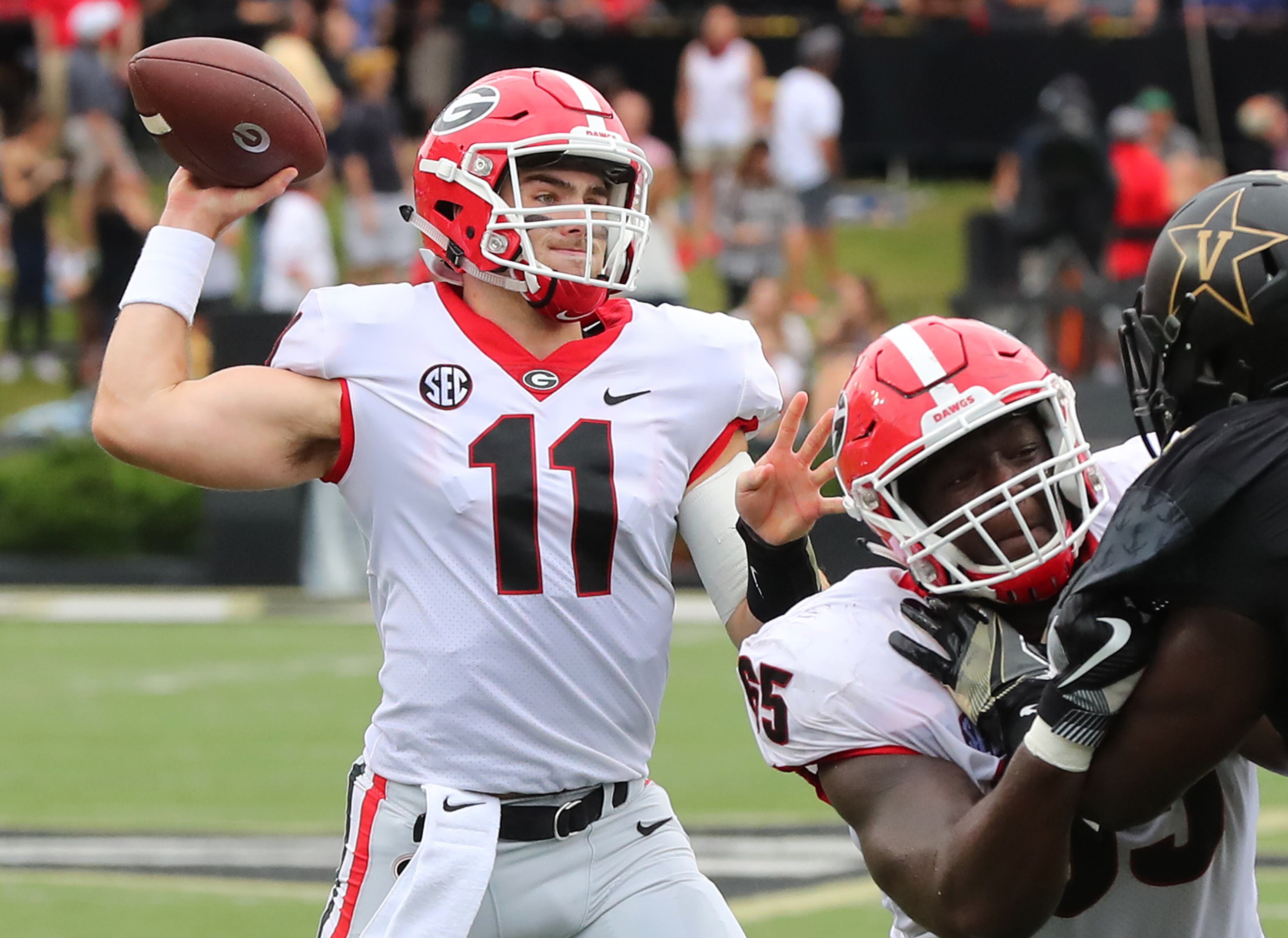 October 7, 2017 Nashville: Georgia quarterback Jake Fromm completes a pass against Vanderbilt during the first half in a NCAA college football game on Saturday, October 7, 2017, in Nashville. Curtis Compton/ccompton@ajc.com
