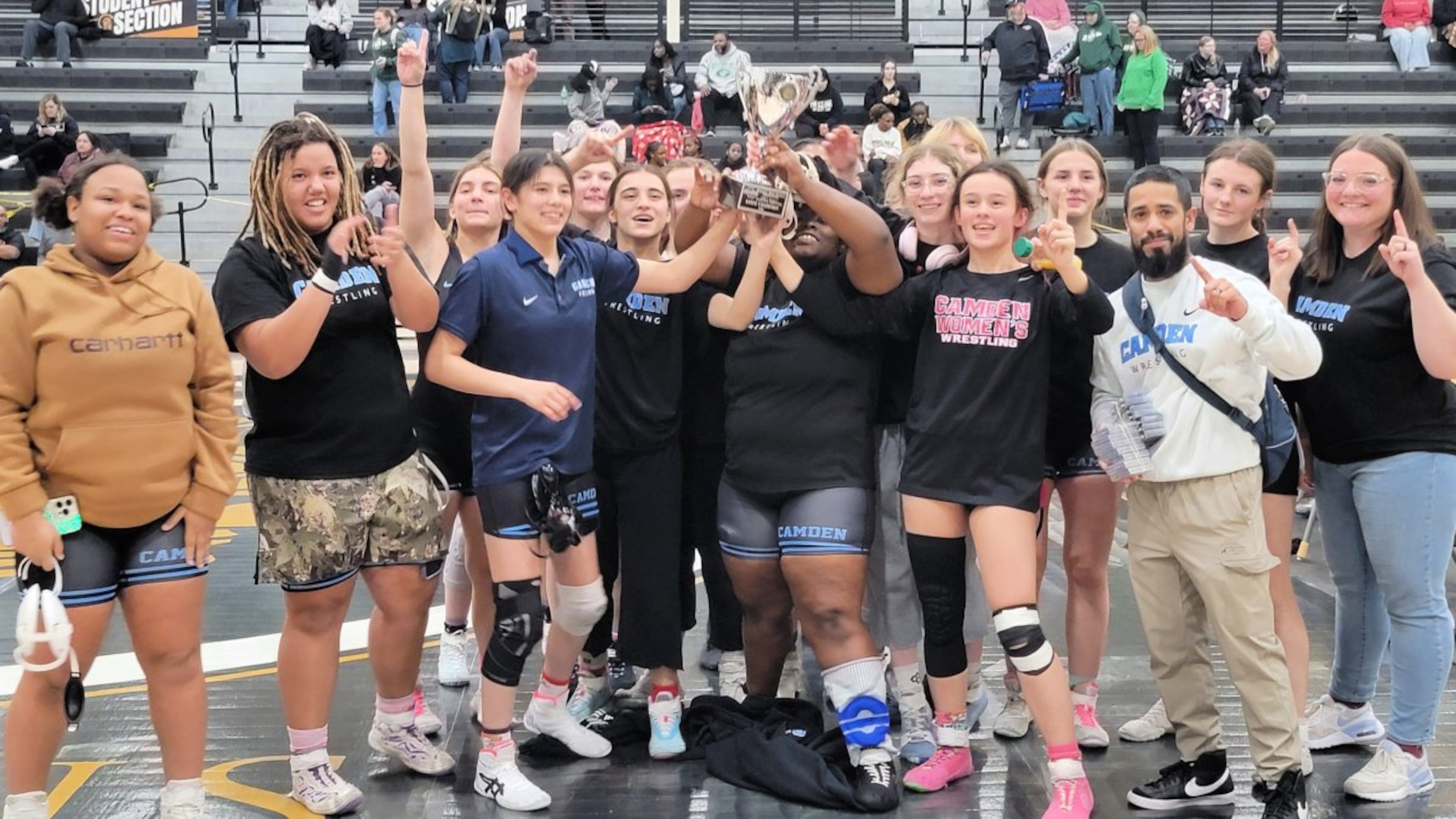 Camden County celebrates its GHSA Division I girls wrestling dual championship victory Friday, Jan. 23, 2026, in Carrollton. (Courtesy of GHSA)