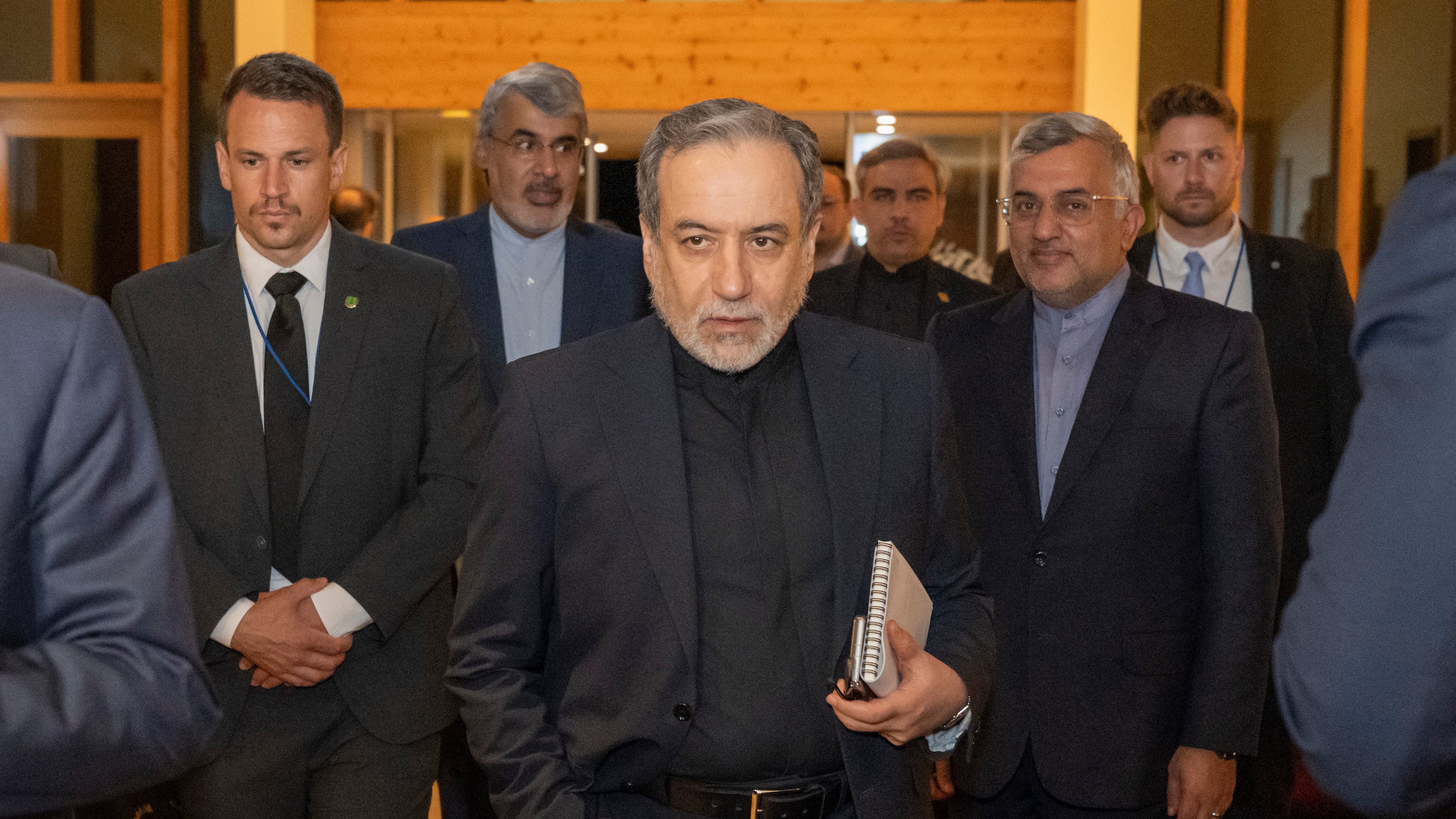Iranian Foreign Minister Seyyed Abbas Araghchi, center, arrives at the Buergenstock resort in Obbuergen, near Lucerne, Switzerland, early Sunday, June 21, 2026. (Urs Flueeler/Keystone, Pool via AP)