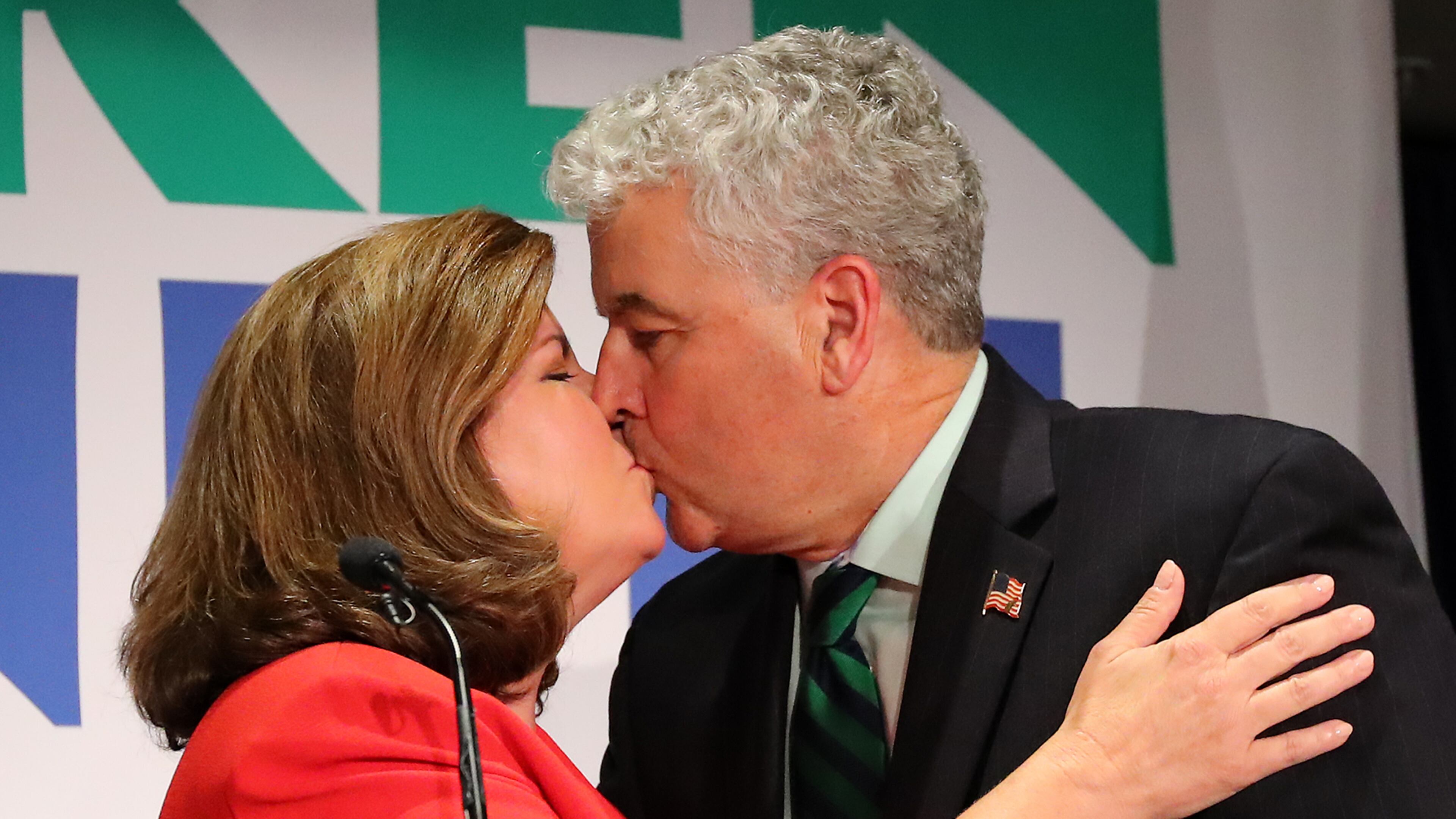 Republican Karen Handel smooches her husband Steve during the election night party in the Sixth District race with Democrat Jon Ossoff on Tuesday. Curtis Compton, ccompton@ajc.com