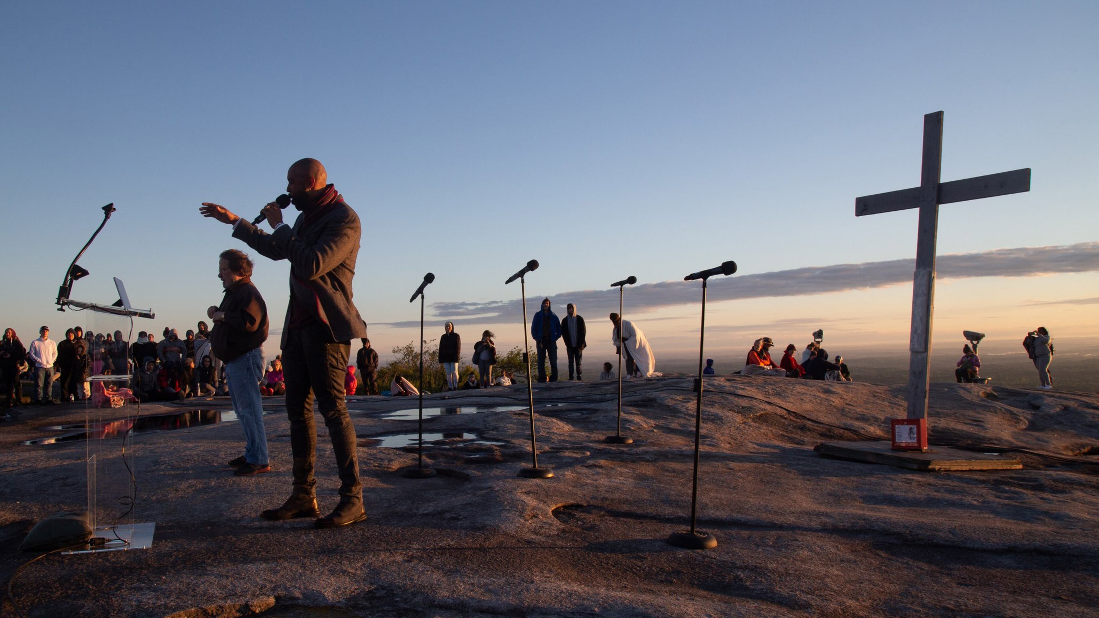 Montell Jordan delivers the Message to the crowd at the 75th Annual Easter Sunrise Service on the top of Stone Mountain last year. Jordan, a former Billboard Top Ten artist, now serves as executive pastor for Victory World Church in Norcross. A similar Easter service at Kennesaw Mountain National Battlefield Park has been canceled, and the Stone Mountain service could be canceled this year due to the coronavirus. STEVE SCHAEFER / SPECIAL TO THE AJC