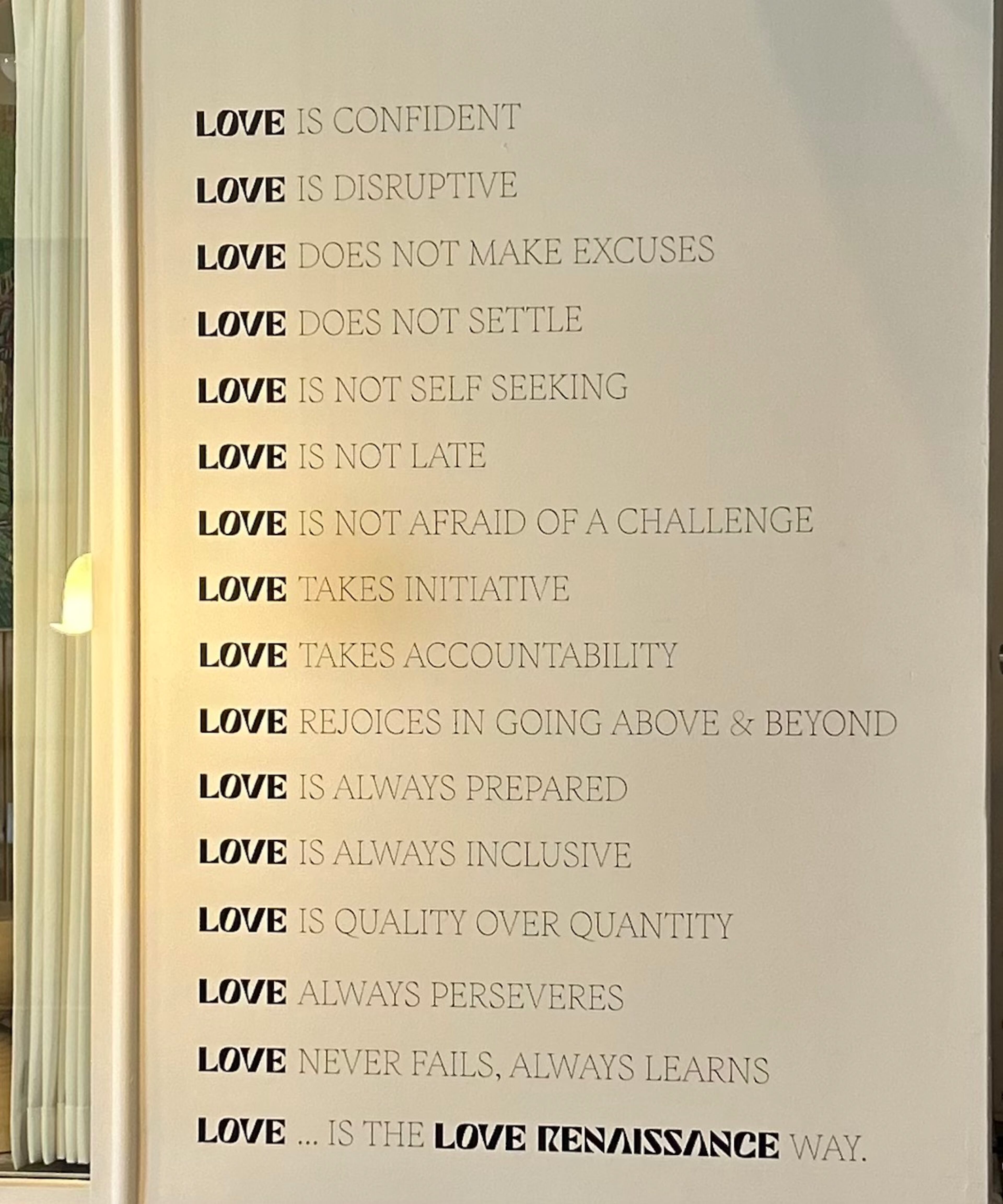 Amber Grimes, Love Renaissance's executive vice president and general manager, had these company ideals painted on a hallway wall of the company's Castleberry Hill offices. Courtesy of LVRN