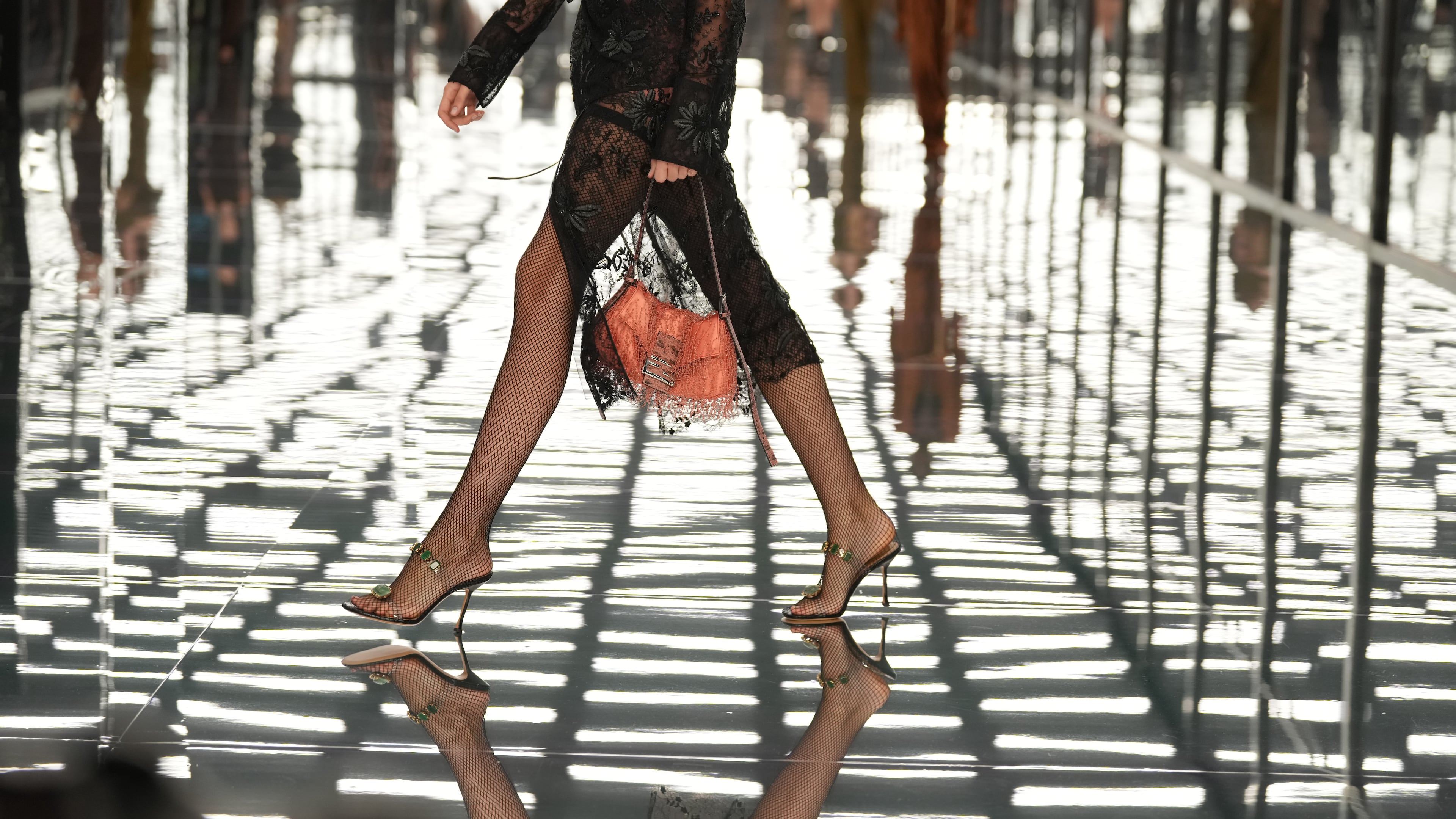 A model wears a creation as part of the Fendi Spring/Summer 2027 Women's collection presented in Milan, Italy, Wednesday, Sept. 23, 2026. (AP Photo/Antonio Calanni)