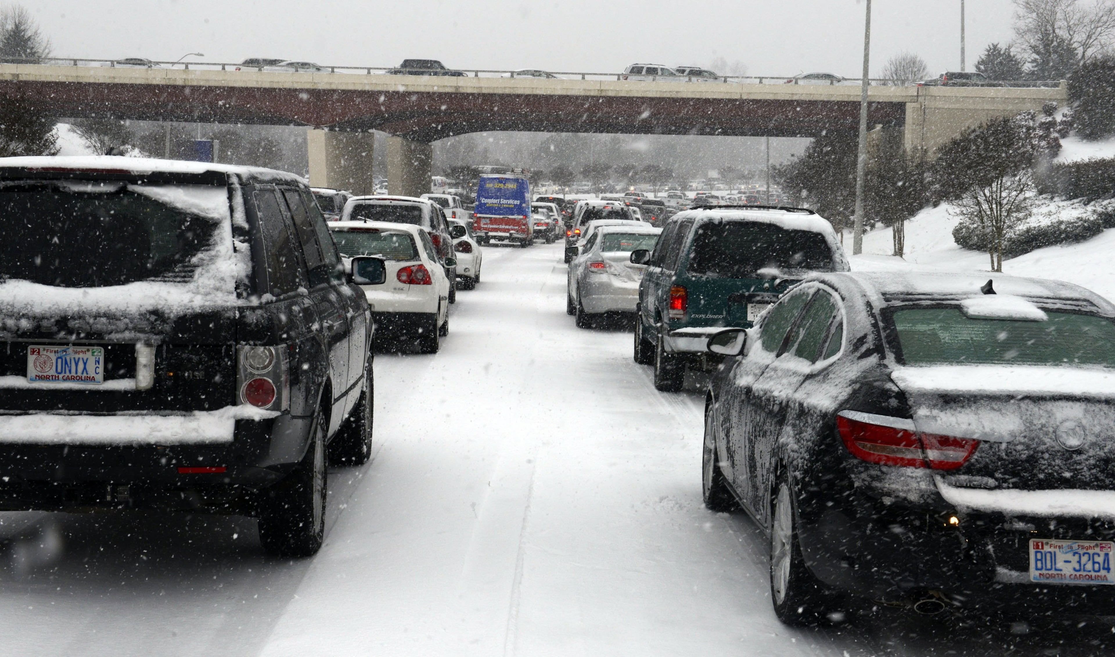 Vehicles come to a standstill going south on S. Saunders Street in Raleigh, N.C., on Wednesday, Feb. 12, 2014, as snow and ice brought traffic to a crawl. (Scott Sharpe/Raleigh News & Observer/MCT)
