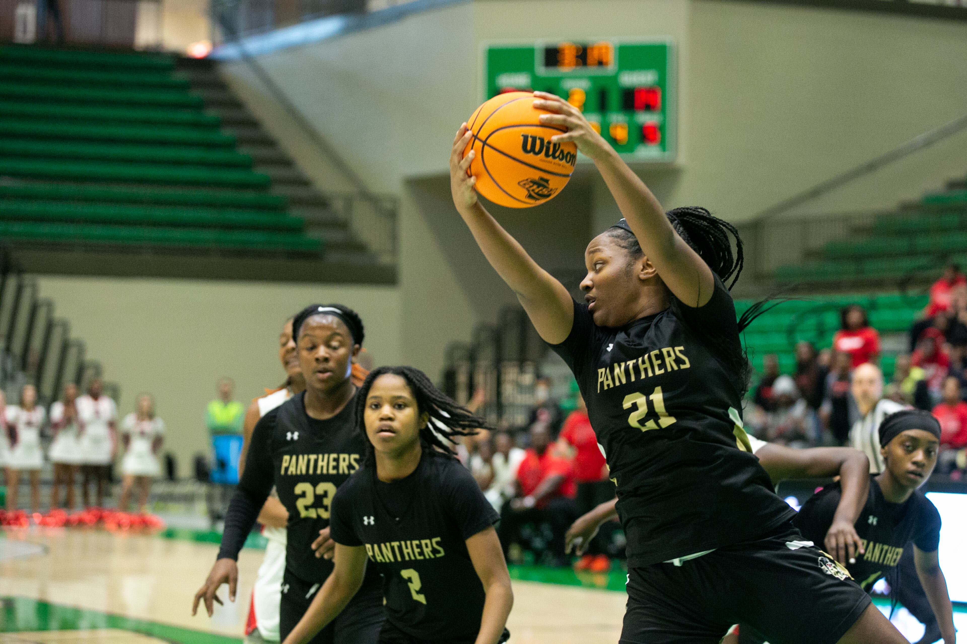 Langston Hughes sophomore Tianna Dismuke (21) takes the rebound during a GHSA basketball game between Langston Hughes High School and Glynn Academy at Buford City Arena in Buford, Georgia, on Friday, February 28, 2020. Glynn Academy won 59-38. (Photo/Rebecca Wright for the AJC)