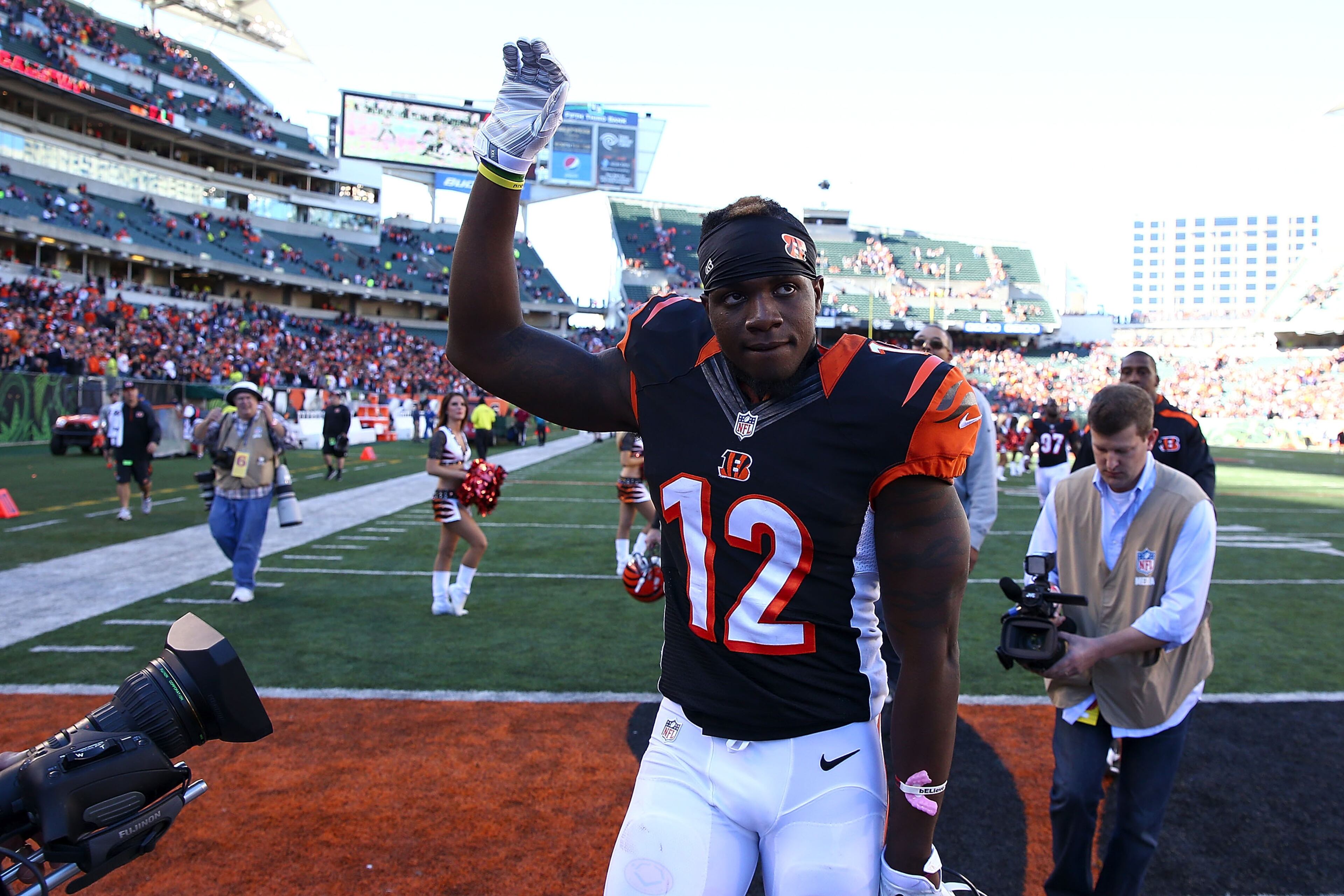 Mohamed Sanu #12 of the Cincinnati Bengals waves to the fans as he walks off of the field after defeating the Baltimore Ravens 27-24 at Paul Brown Stadium on October 26, 2014 in Cincinnati, Ohio. (Photo by Andy Lyons/Getty Images)
