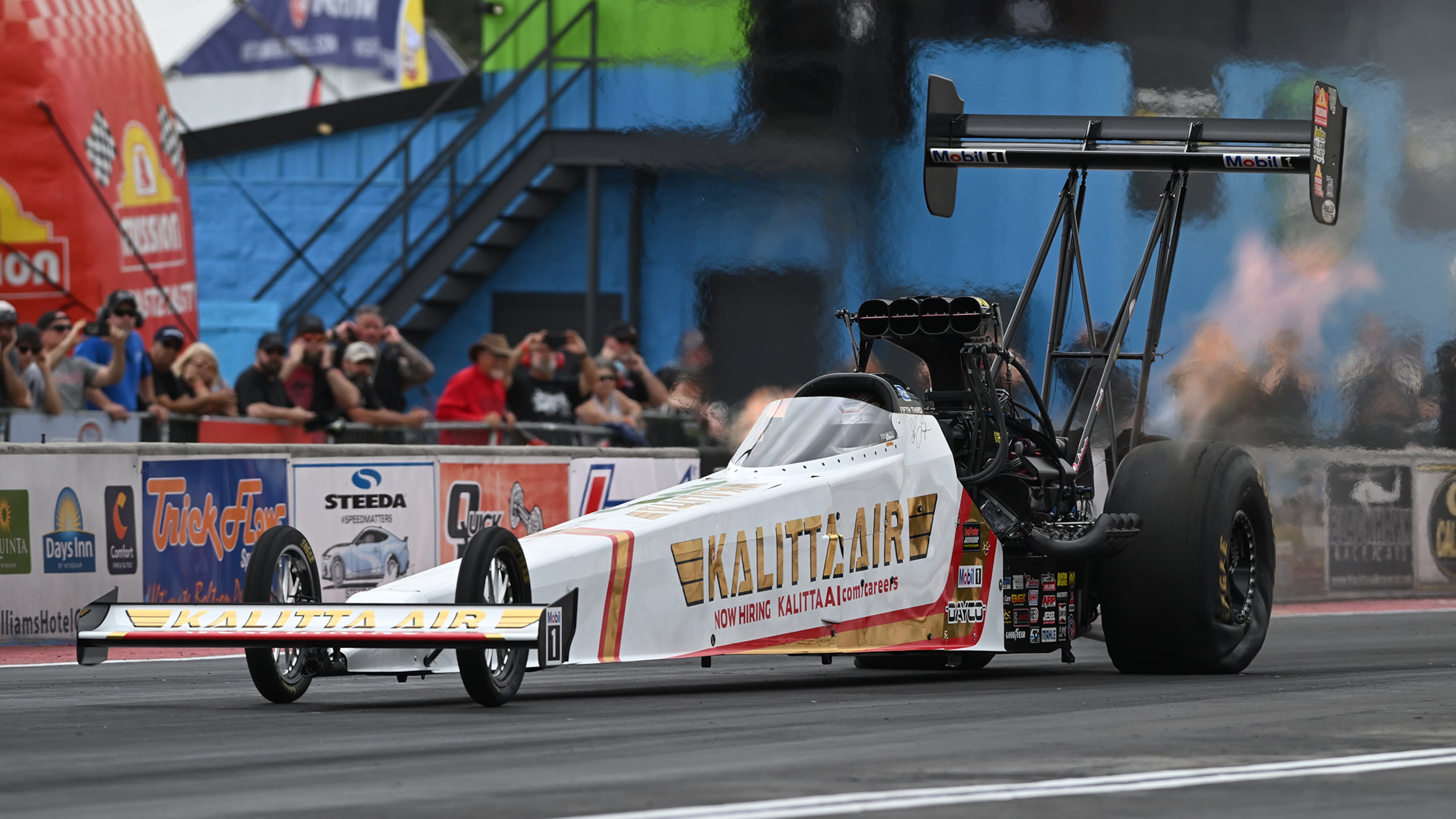 In this photo provided by the NHRA, Top Fuel's Shawn Langdon sets a new NHRA speed record Friday, May 1, 2026, at the NHRA Southern Nationals drag races at South Georgia Motorsports Park in Adel, Ga. (Marc Gewertz/NHRA via AP)