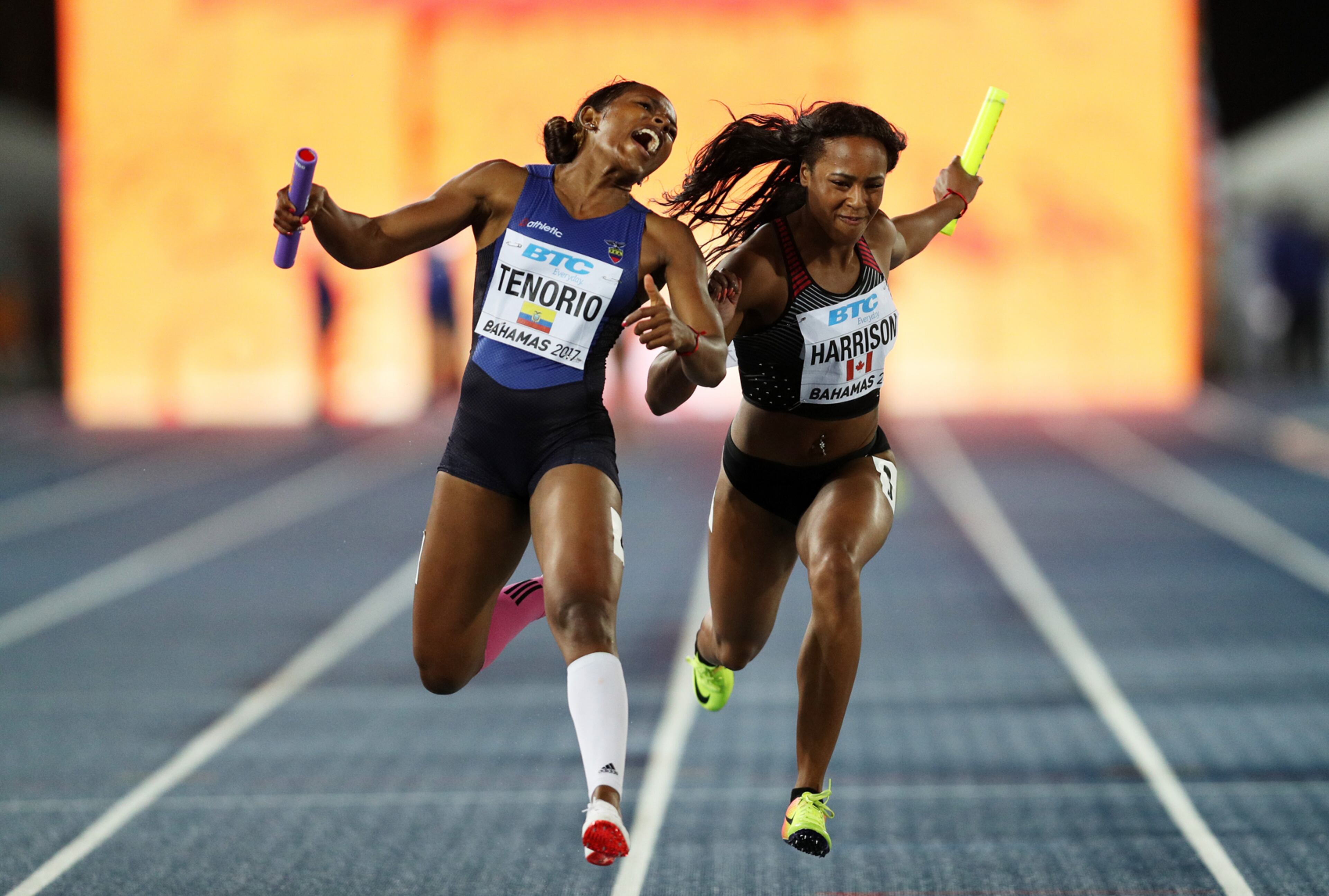 NASSAU, BAHAMAS - APRIL 23: Angela Tenorio of Ecuador and Shaina Harrison of Canada cross the finishline in the Women's 4x100 Metres Relay B Final during the IAAF/BTC World Relays Bahamas 2017 at Thomas Robinson Stadium on April 23, 2017 in Nassau, Bahamas. (Photo by Patrick Smith/Getty Images for IAAF) *** BESTPIX ***