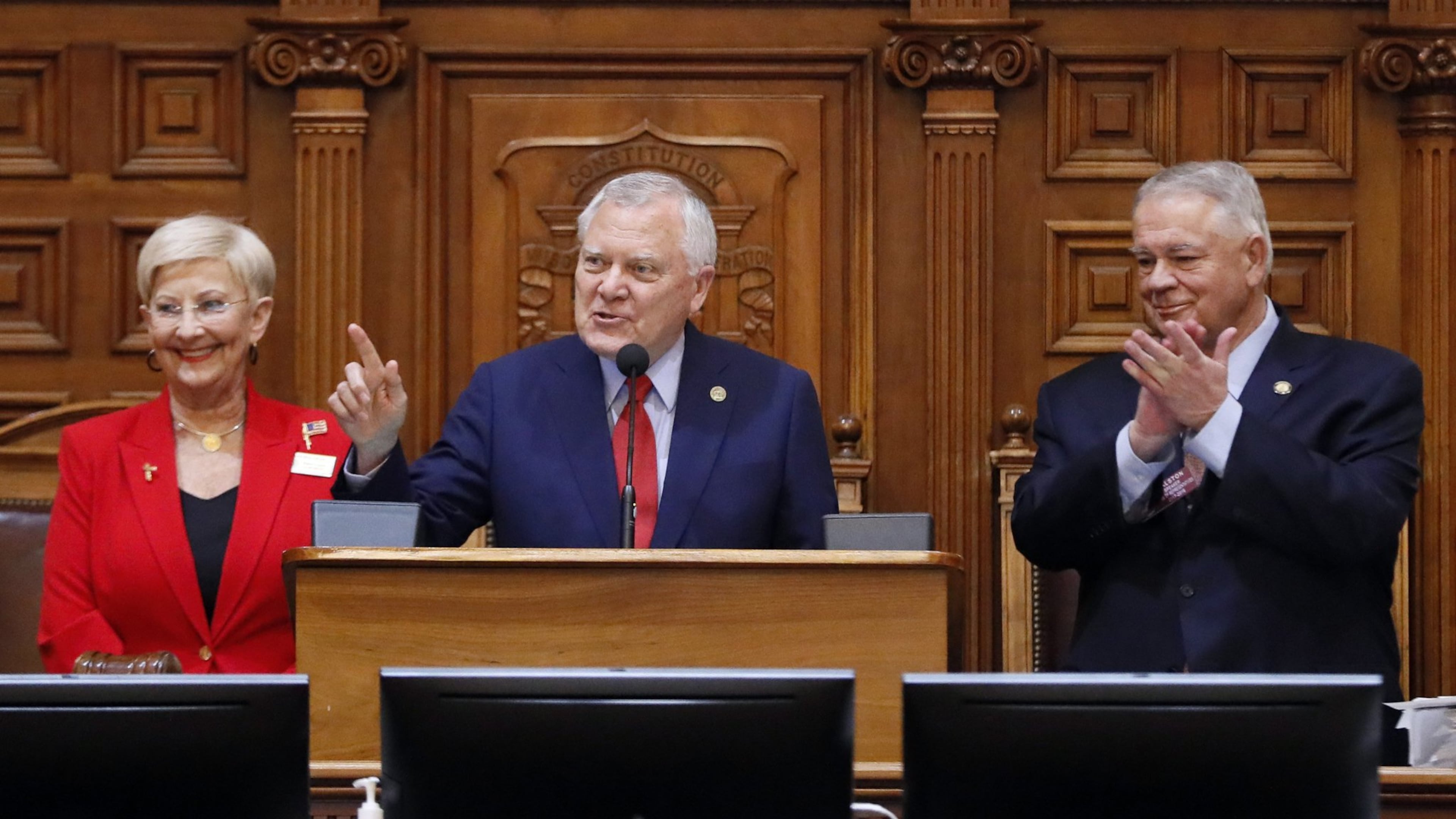 Gov. Nathan Deal, standing with Speaker David Ralston and first lady Sandra Deal, addresses the House for his last Sine Die. Thursday was the 40th and final day of the 2018 General Assembly. BOB ANDRES /BANDRES@AJC.COM