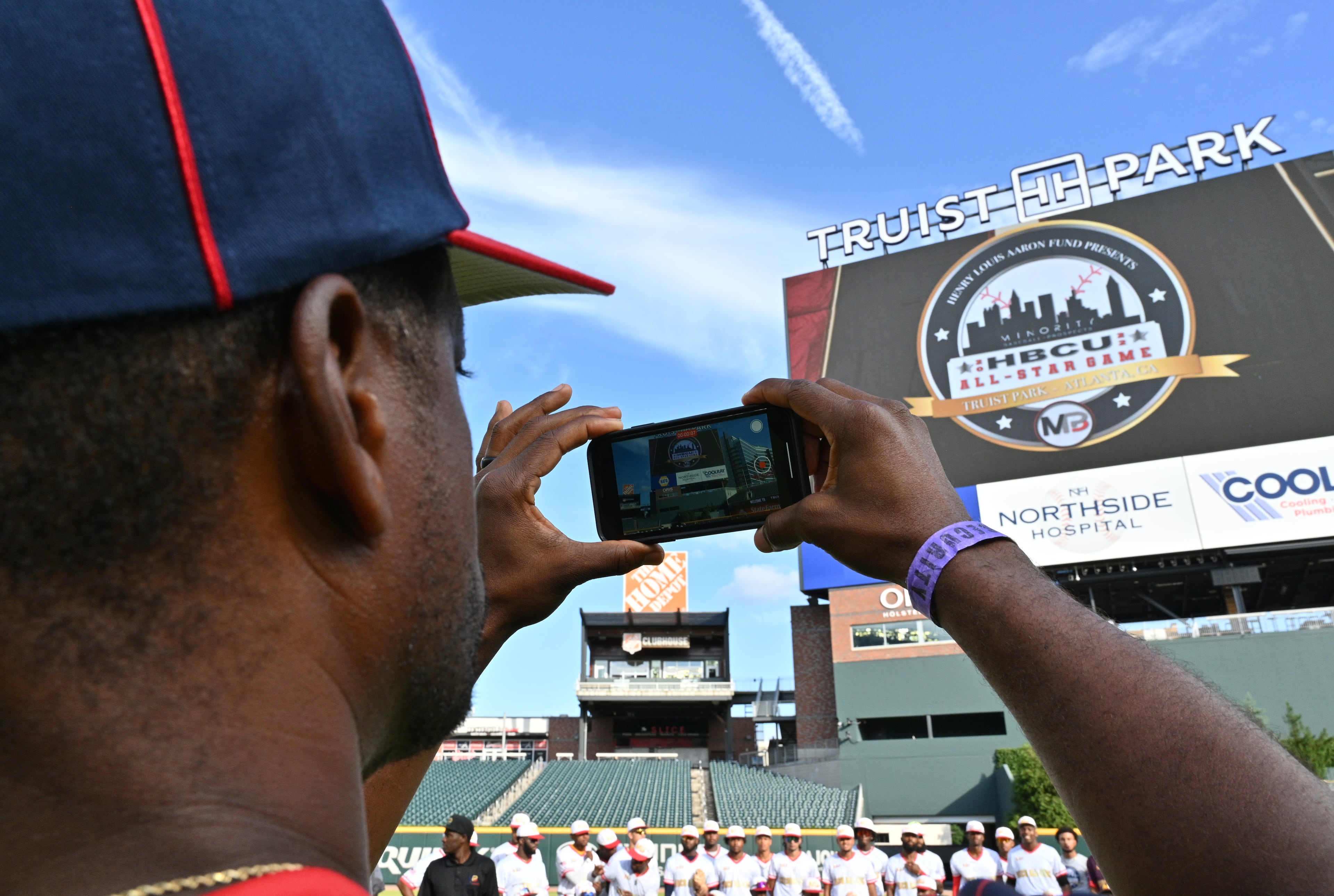 A player takes a picture before the Minority Baseball Prospects HBCU All-Star Game at Truist Park on Friday, June 3, 2022. (Hyosub Shin / Hyosub.Shin@ajc.com)