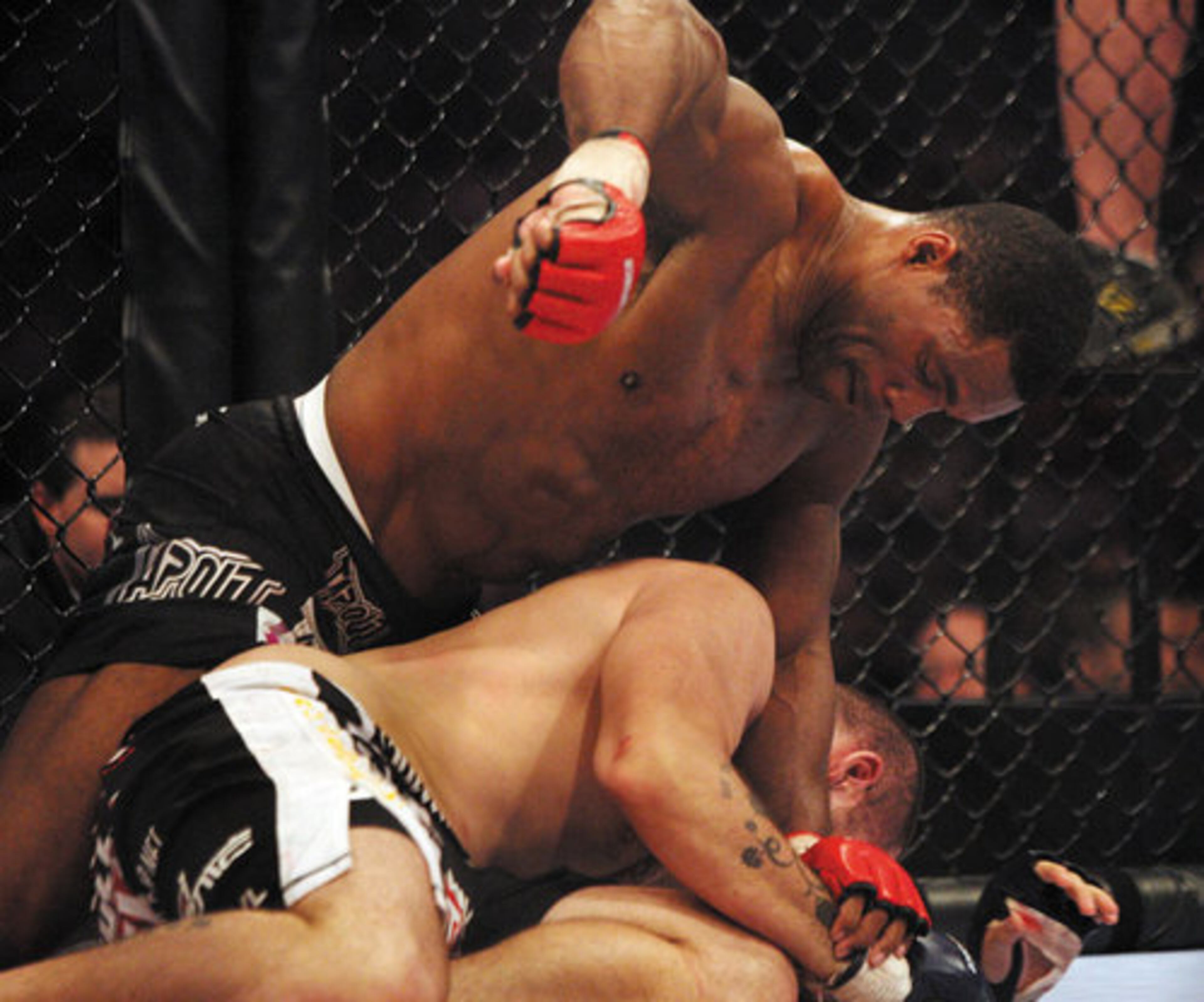 Walker punches Nagy.