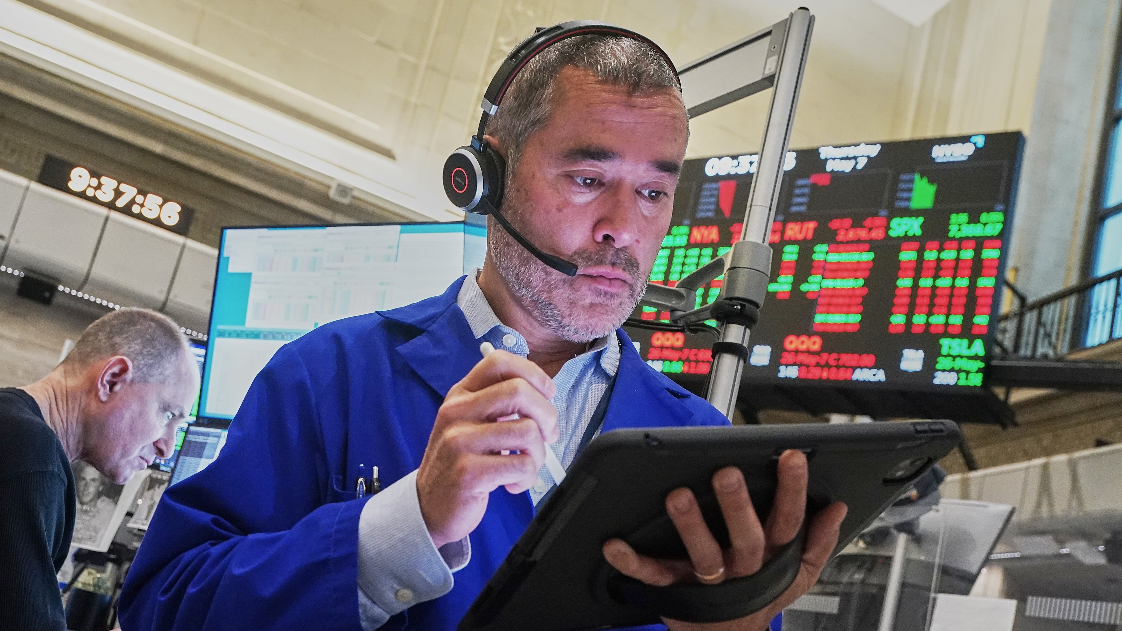 Options trader Justin Kanda works on the floor of the New York Stock Exchange, Thursday, May 7, 2026. (AP Photo/Richard Drew)