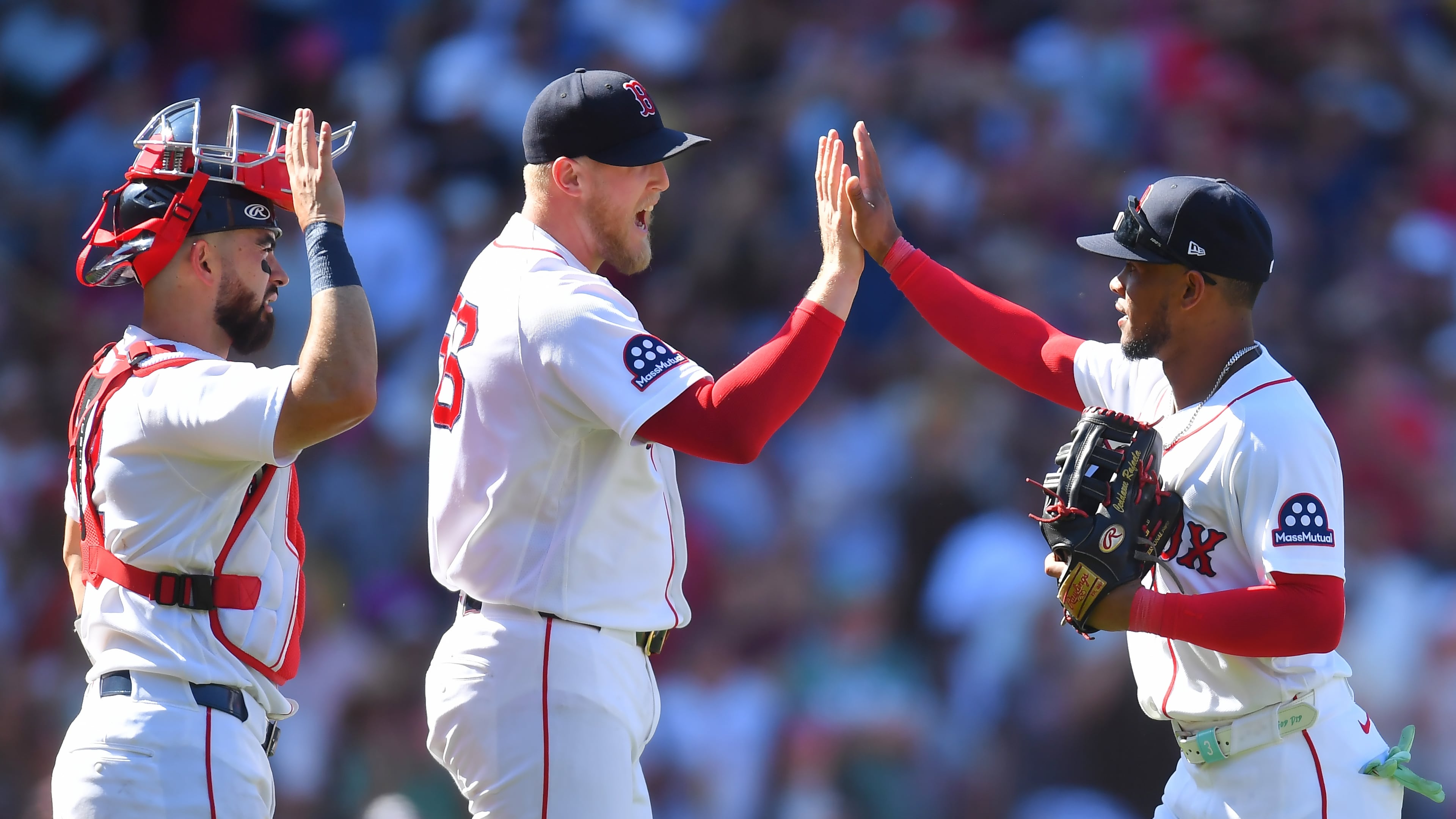 Boston Red Sox's Connor Wong, left, Ryan Watson, center, and Ceddanne Rafaela, right, celebrate after their team's win over the Tampa Bay Rays in a baseball game, Sunday, July 19, 2026, in Boston. (AP Photo/Steven Senne)