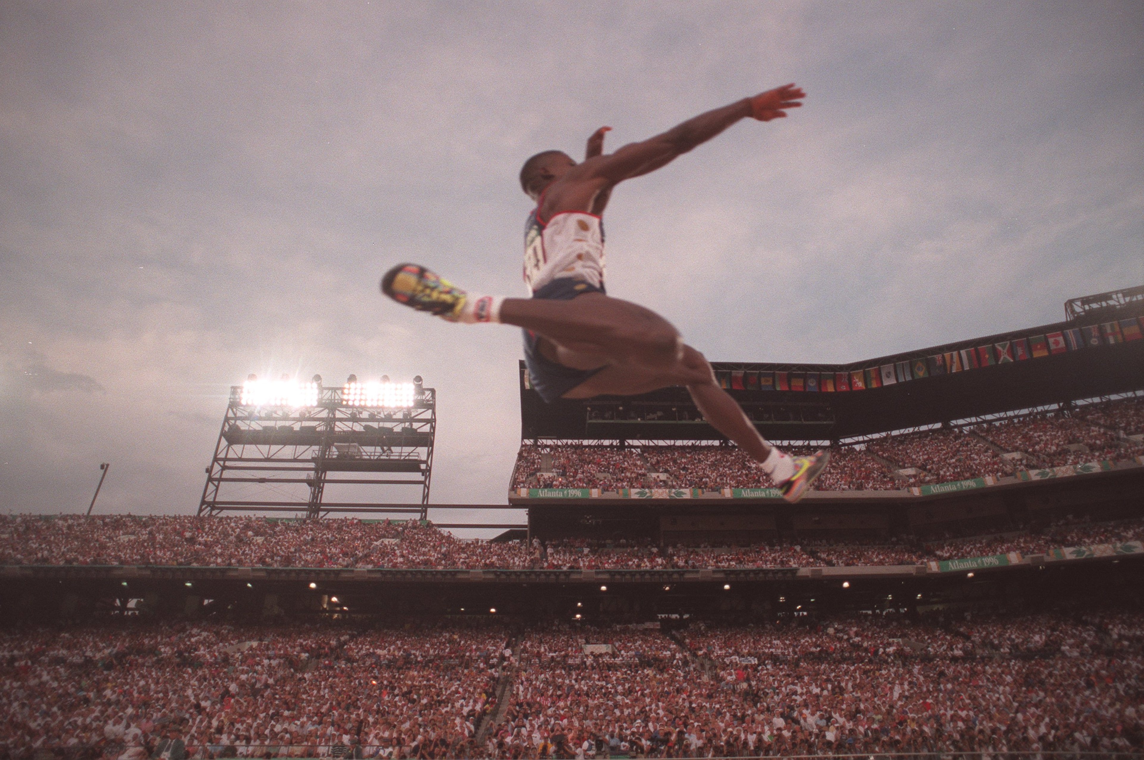 Carl Lewis wins the long jump