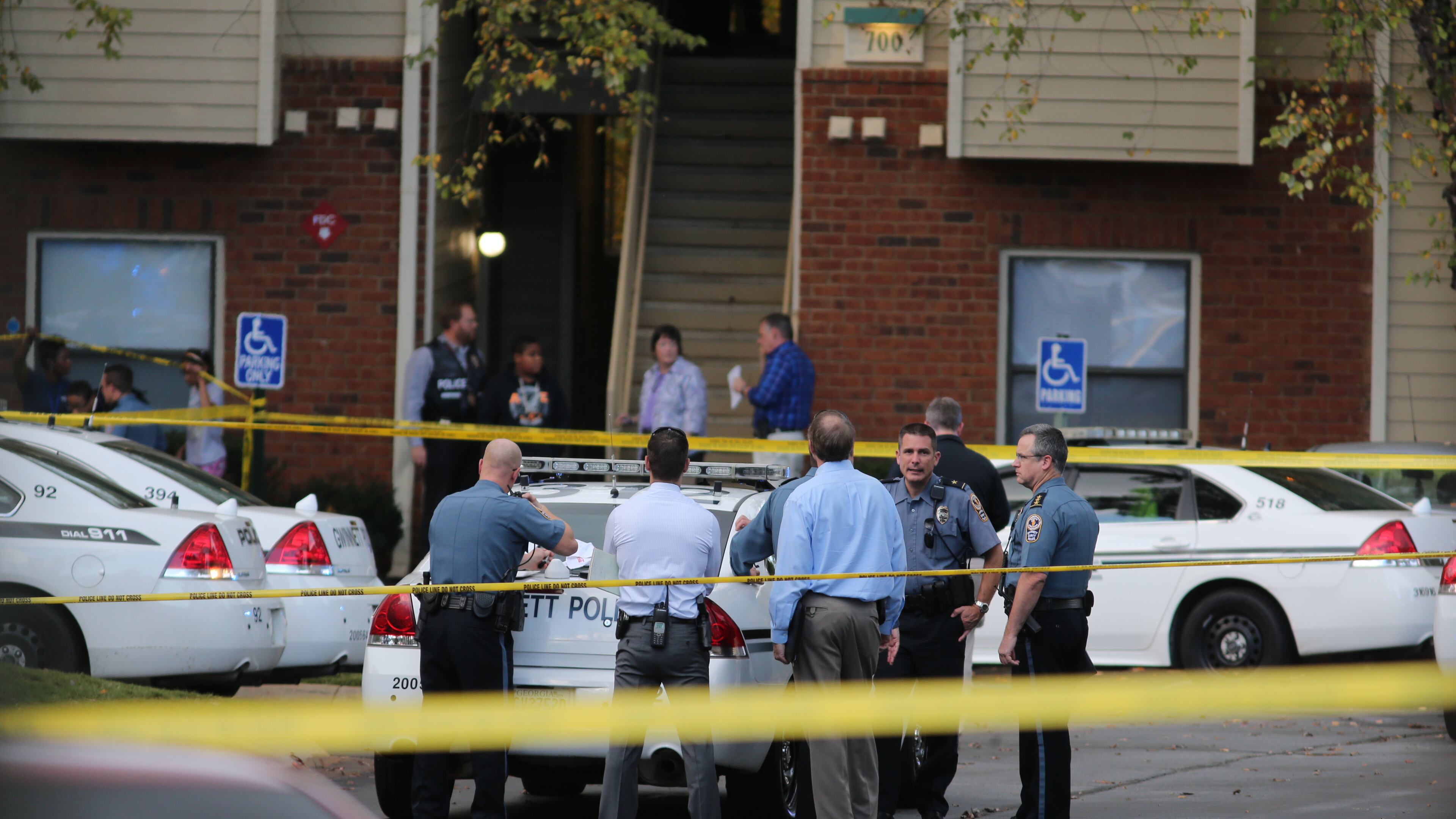 Authorities were investigating an officer-involved shooting at an apartment complex in Gwinnett County on Wednesday, Oct. 28, 2015. (Ben Gray / bgray@ajc.com)