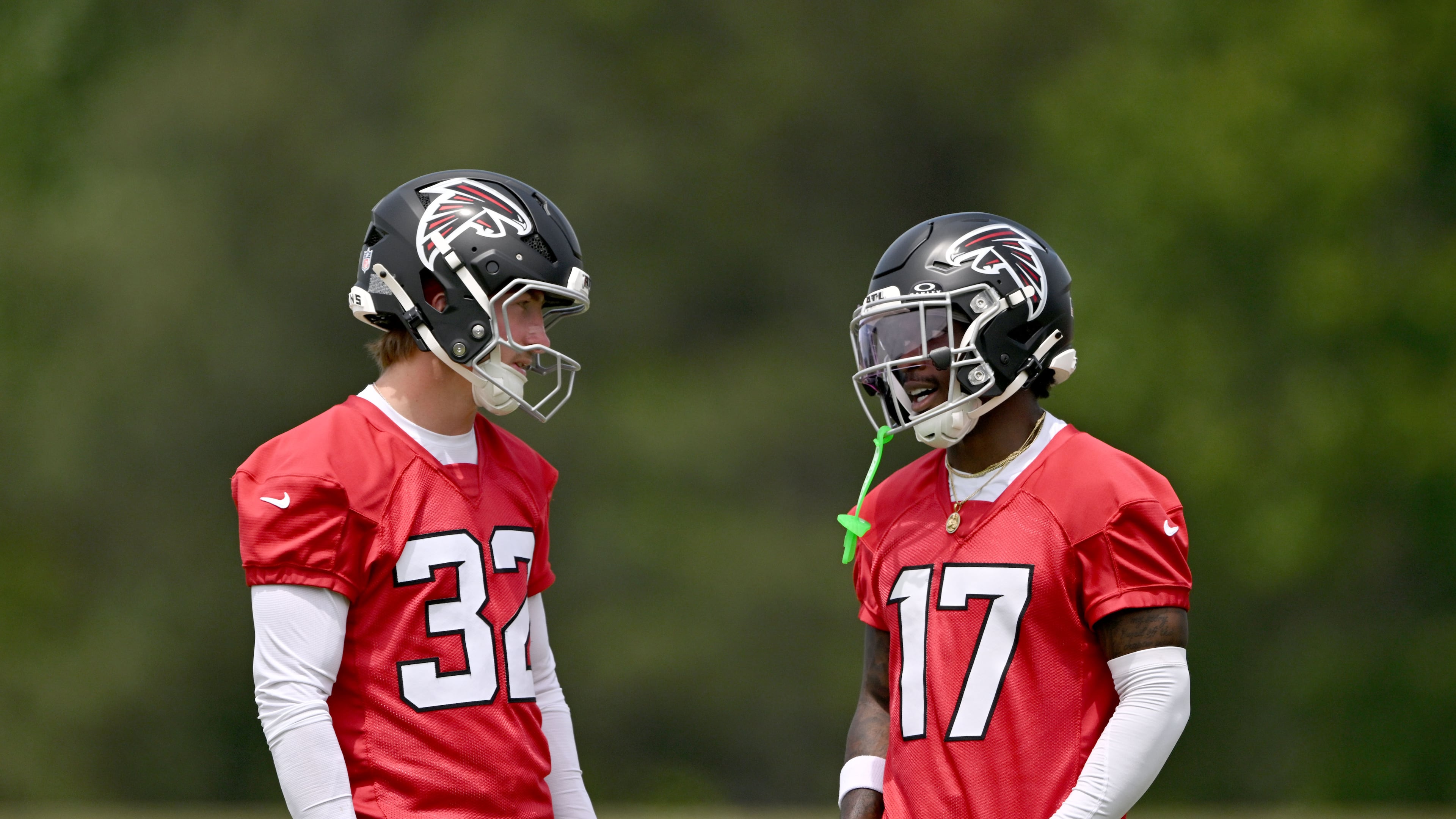 Atlanta Falcons rookie running back Cash Jones (32) and Atlanta Falcons rookie wide receiver Zachariah Branch (17) chat during the Falcons’ rookie minicamp at the team’s training facility on Friday, May 8, 2026, in Flowery Branch. (Hyosub Shin/AJC)