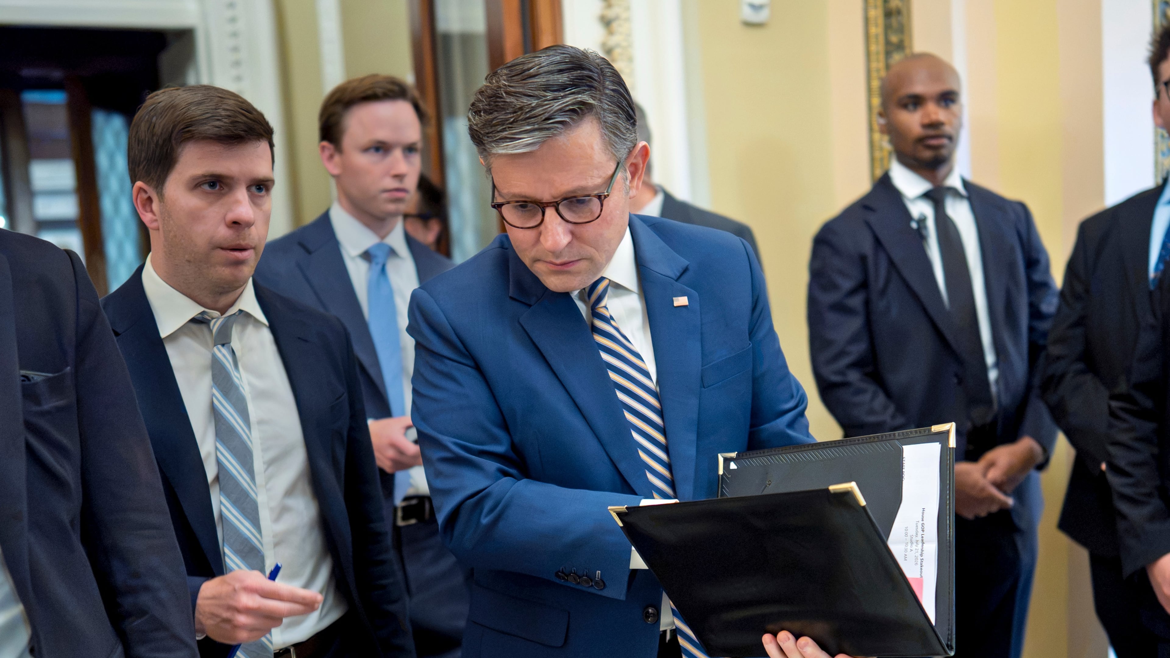 Speaker of the House Mike Johnson, R-La., leaves the chamber as members debate a series of measures including a continuing resolution to fund the government and a spending package for the Iran war, at the Capitol in Washington, Tuesday, July 21, 2026. (AP Photo/J. Scott Applewhite)