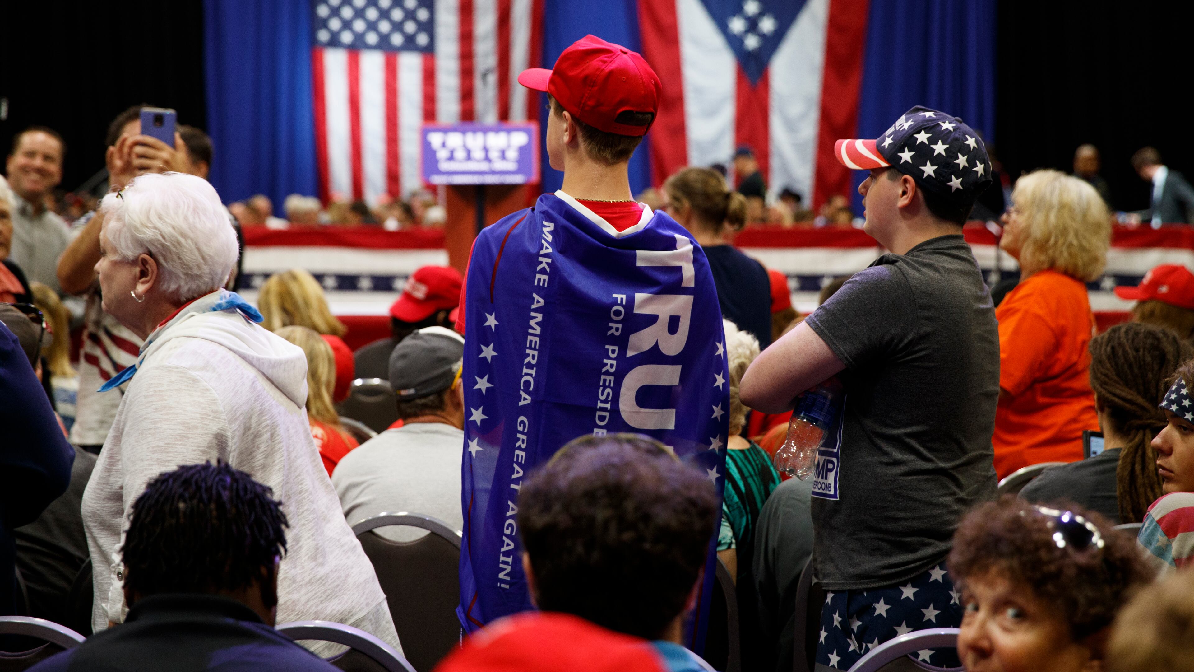 Nick Moriarty of Columbus, Ohio, and others, wait for the arrival of Republican presidential candidate Donald Trump to a town hall event on Monday in Columbus, Ohio . AP/Evan Vucci