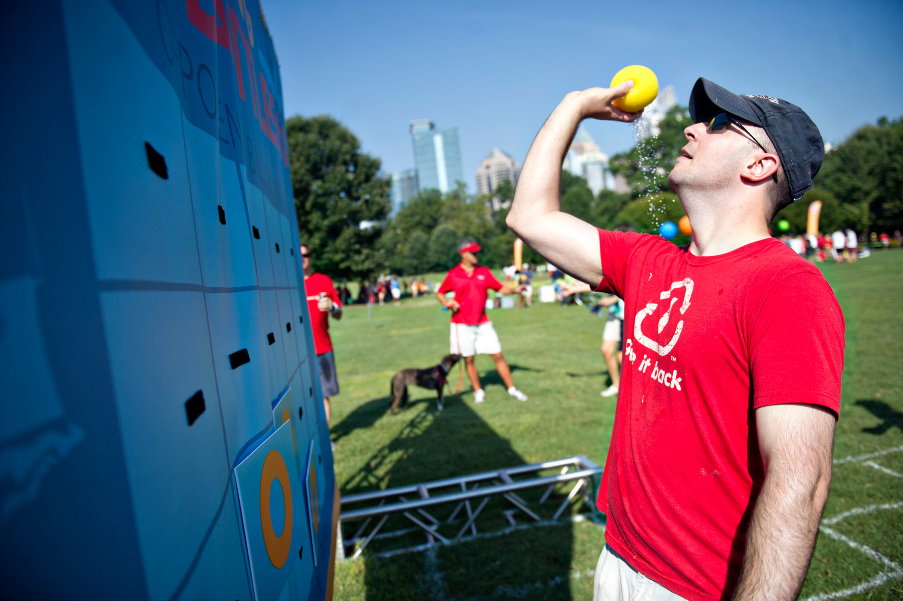 Brian Genco plays a game of living battleship during the Boys & Girls Clubs of America's Day for Kids at Piedmont Park in Atlanta on Saturday, September 7, 2013. Day for Kids is a national initiative to raise awareness for critical issues facing young men and women. With more than a decade of tradition, Day for Kids invites adults to act like kids again by participating in field day events such as relay races, dodge ball, tug of war and lots of other activities. JONATHAN PHILLIPS / SPECIAL
